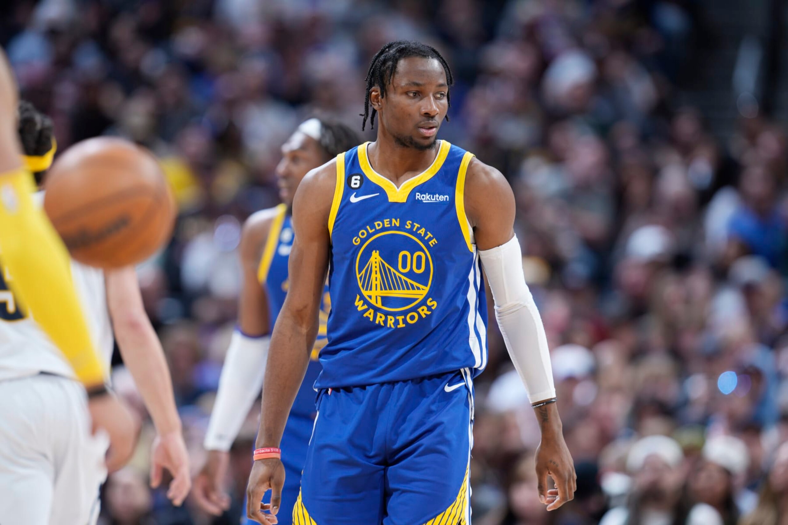 Golden State Warriors forward Jonathan Kuminga (00) in the second half of an NBA basketball game Sunday, April 2, 2023, in Denver. (AP Photo/David Zalubowski) Golden State Warriors forward Jonathan Kuminga (00) in the second half of an NBA basketball game Sunday, April 2, 2023, in Denver. (AP Photo/David Zalubowski)
