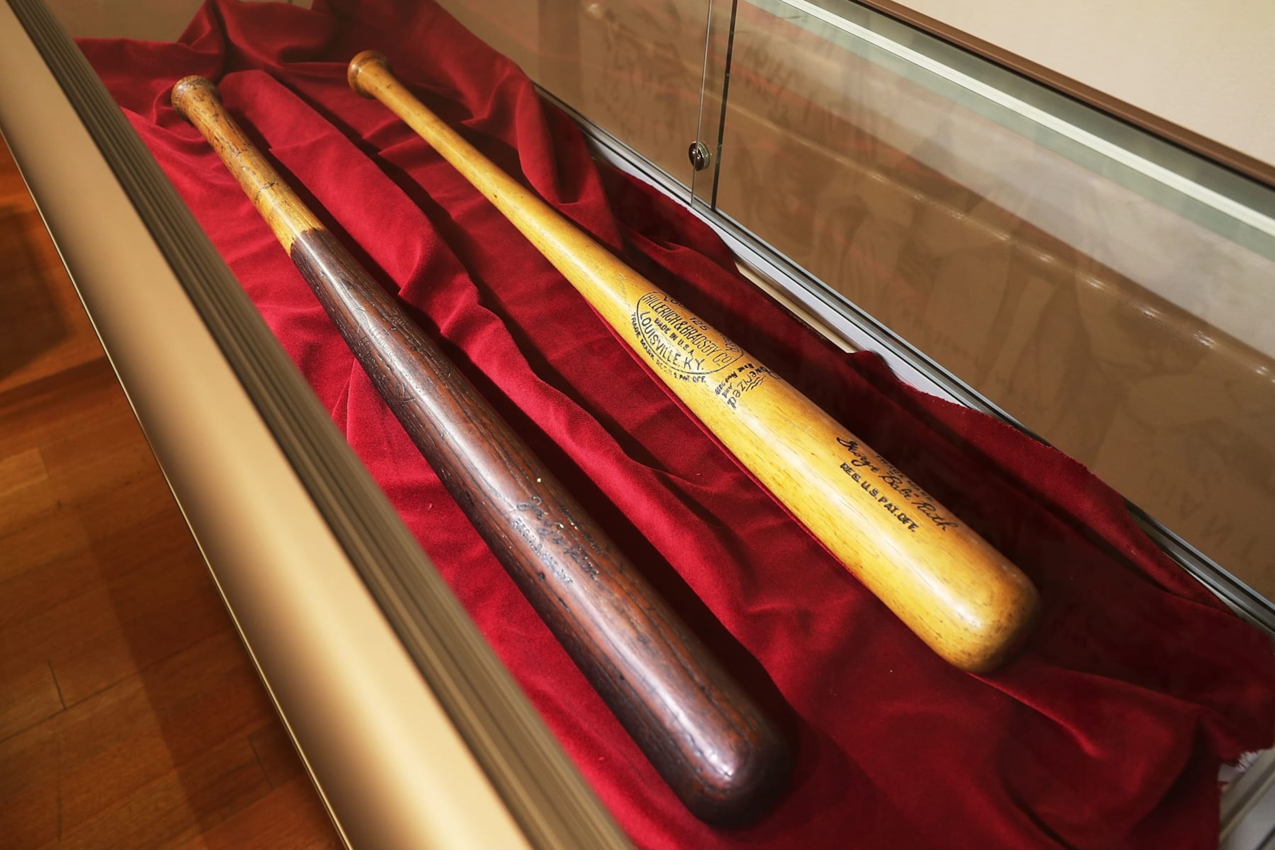NEW YORK, NY - OCTOBER 13: A bat owned by baseball legend Babe Ruth (right) and one owned by "Shoeless" Joe Jackson are displayed at auction house Christie's for the upcoming sale 'The Golden Age of Baseball' on October 13, 2016 in New York City. Over 400 items are up for sale, including a bat once swung by Micky Mantle and baseballs signed by Babe Ruth and Jackie Robinson. Some pieces are expected to draw up to $700,000 at the auction on October 19 and 20.  (Photo by Spencer Platt/Getty Images)