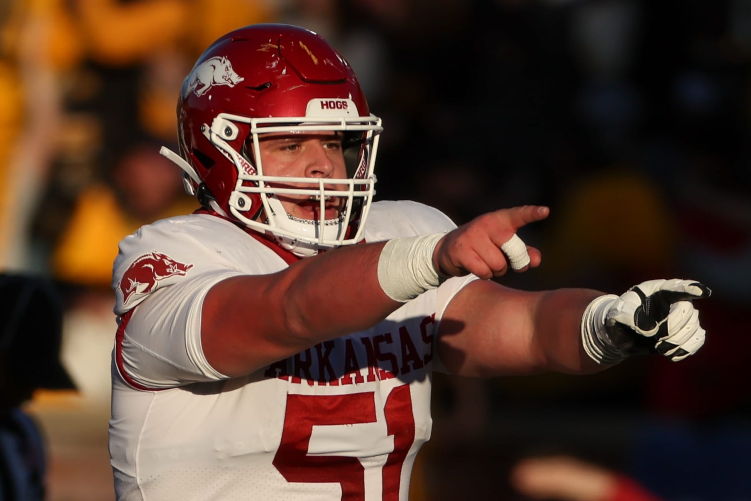COLUMBIA, MO - NOVEMBER 25: Arkansas Razorbacks offensive lineman Ricky Stromberg (51) points out the defense in the second quarter of an SEC college football game between the Arkansas Razorbacks and Missouri Tigers on November 25, 2022 at Memorial Stadium in Columbia, MO. (Photo by Scott Winters/Icon Sportswire via Getty Images)
