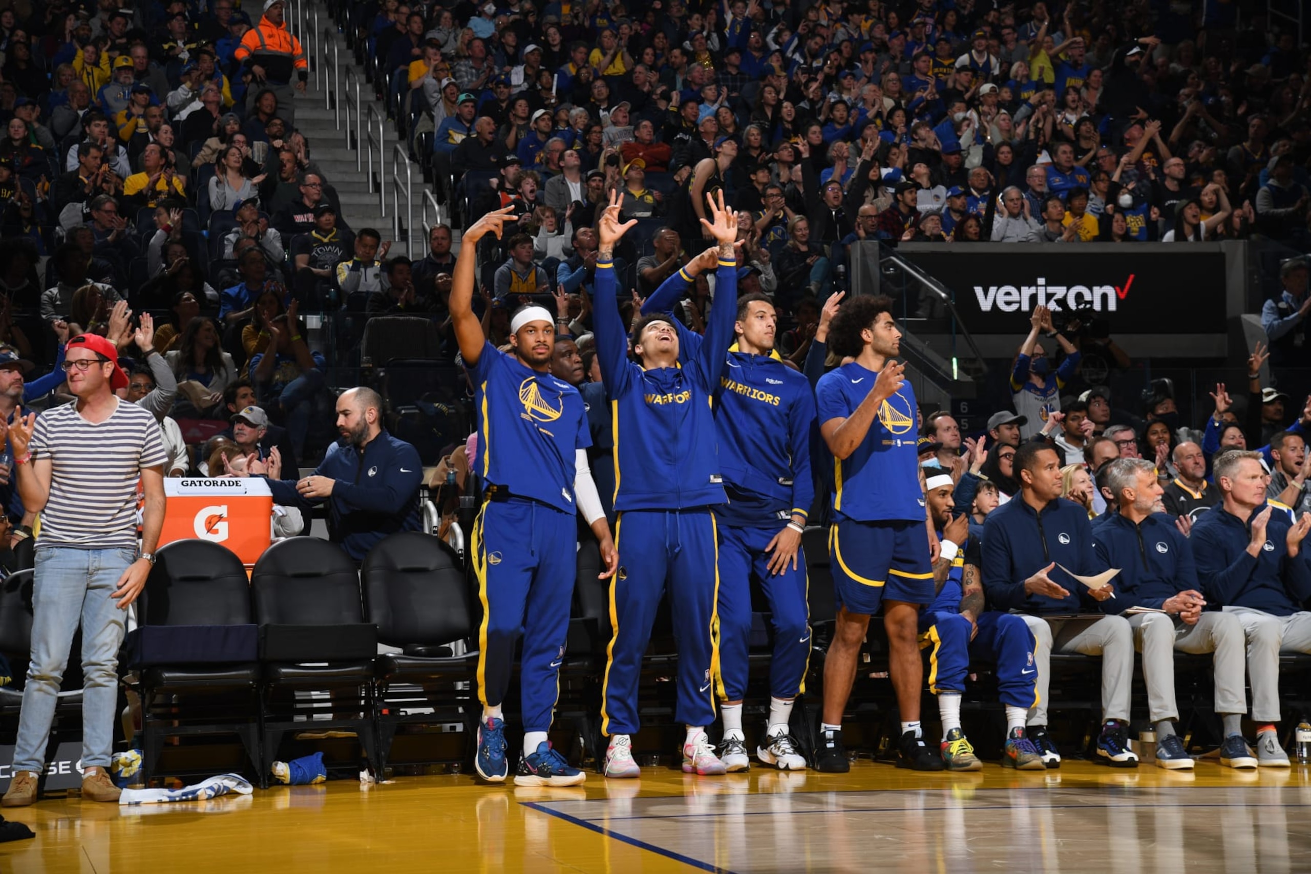 SAN FRANCISCO, CA - MARCH 26: Golden State Warriors bench celebrates a three point basket during the game against the Minnesota Timberwolves on March 26, 2023 at Chase Center in San Francisco, California. NOTE TO USER: User expressly acknowledges and agrees that, by downloading and or using this photograph, user is consenting to the terms and conditions of Getty Images License Agreement. Mandatory Copyright Notice: Copyright 2023 NBAE (Photo by Noah Graham/NBAE via Getty Images)