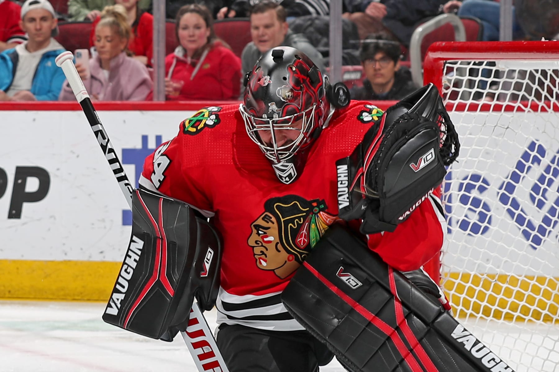 CHICAGO, ILLINOIS - MARCH 30: The puck flys past goalie Petr Mrazek #34 of the Chicago Blackhawks in the second period against the St. Louis Blues at United Center on March 30, 2023 in Chicago, Illinois. (Photo by Chase Agnello-Dean/NHLI via Getty Images)