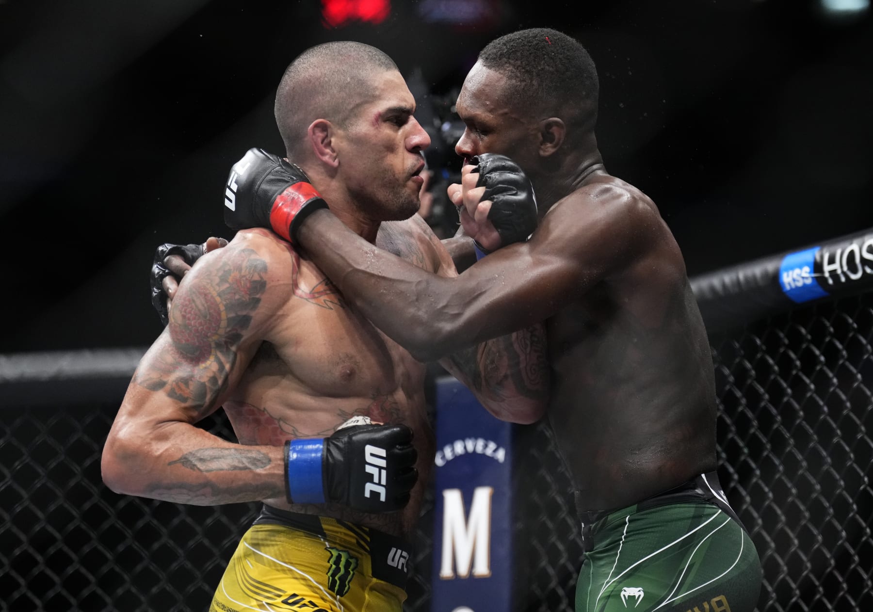 Alex Pereira (left) and Israel Adesanya.