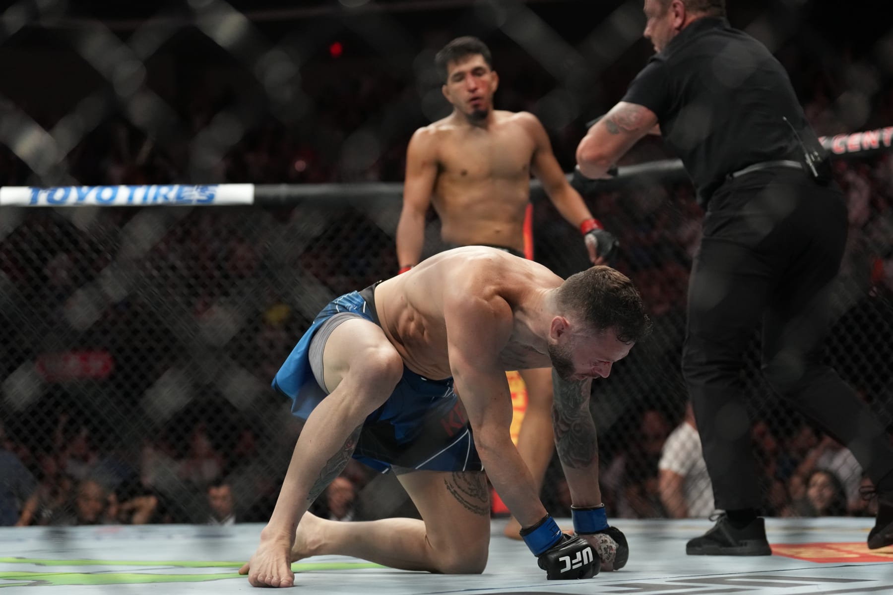 AUSTIN, TX - JUNE 18: Adrian Yanez (back) knocks out Tony Kelley in their bantamweight bout during the UFC Fight Night: Kattar v Emmett event at June 18, 2022, Moody Center on in Austin, Texas. (Photo by Louis Grasse/PxImages/Icon Sportswire via Getty Images)