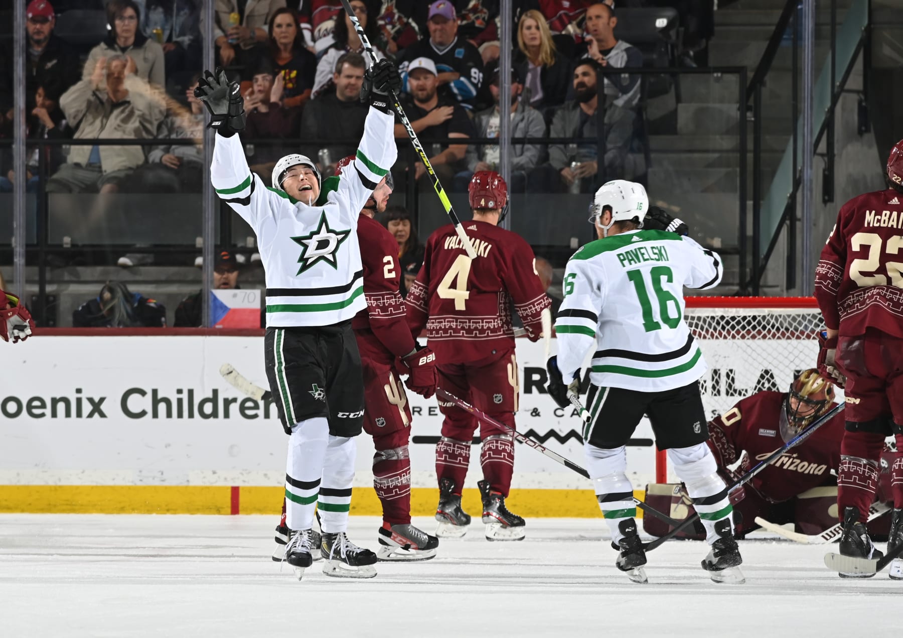TEMPE, ARIZONA - MARCH 31: Jason Robertson #21 of the Dallas Stars celebrates with teammate Joe Pavelski #16 after scoring a goal against the Arizona Coyotes during the second period at Mullett Arena on March 31, 2023 in Tempe, Arizona. (Photo by Norm Hall/NHLI via Getty Images)