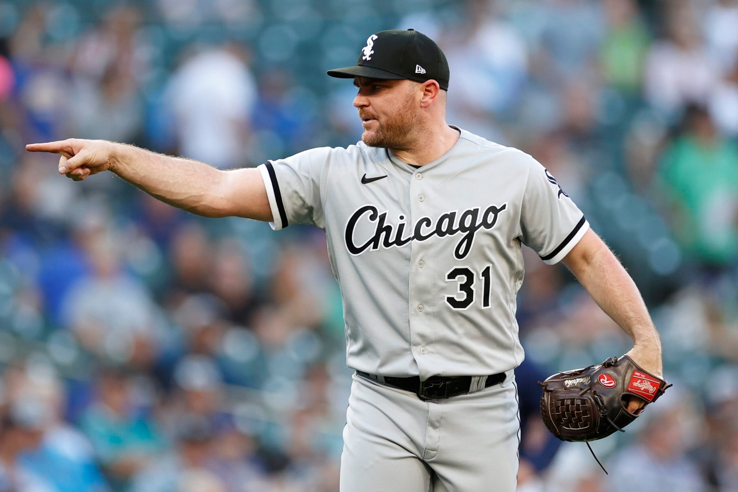 SEATTLE, WASHINGTON - SEPTEMBER 07: Liam Hendriks #31 of the Chicago White Sox reacts after the final out to beat Seattle Mariners 9-6 at T-Mobile Park on September 07, 2022 in Seattle, Washington. (Photo by Steph Chambers/Getty Images)