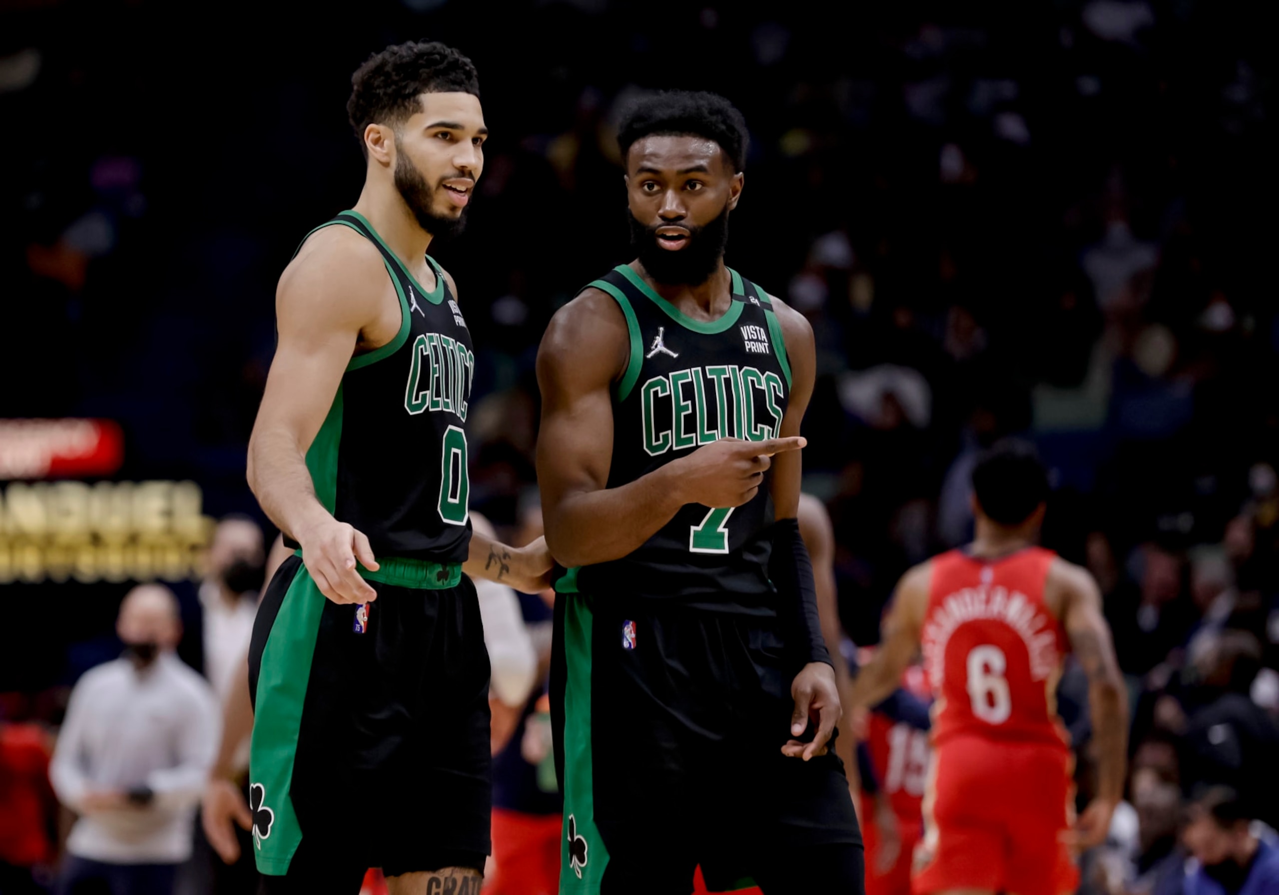 Boston Celtics forward Jayson Tatum (0) and guard Jaylen Brown (7) talk during a timeout in the fourth quarter of an NBA basketball game against the New Orleans Pelicans in New Orleans, Saturday, Jan. 29, 2022. (AP Photo/Derick Hingle) Boston Celtics forward Jayson Tatum (0) and guard Jaylen Brown (7) talk during a timeout in the fourth quarter of an NBA basketball game against the New Orleans Pelicans in New Orleans, Saturday, Jan. 29, 2022. (AP Photo/Derick Hingle)