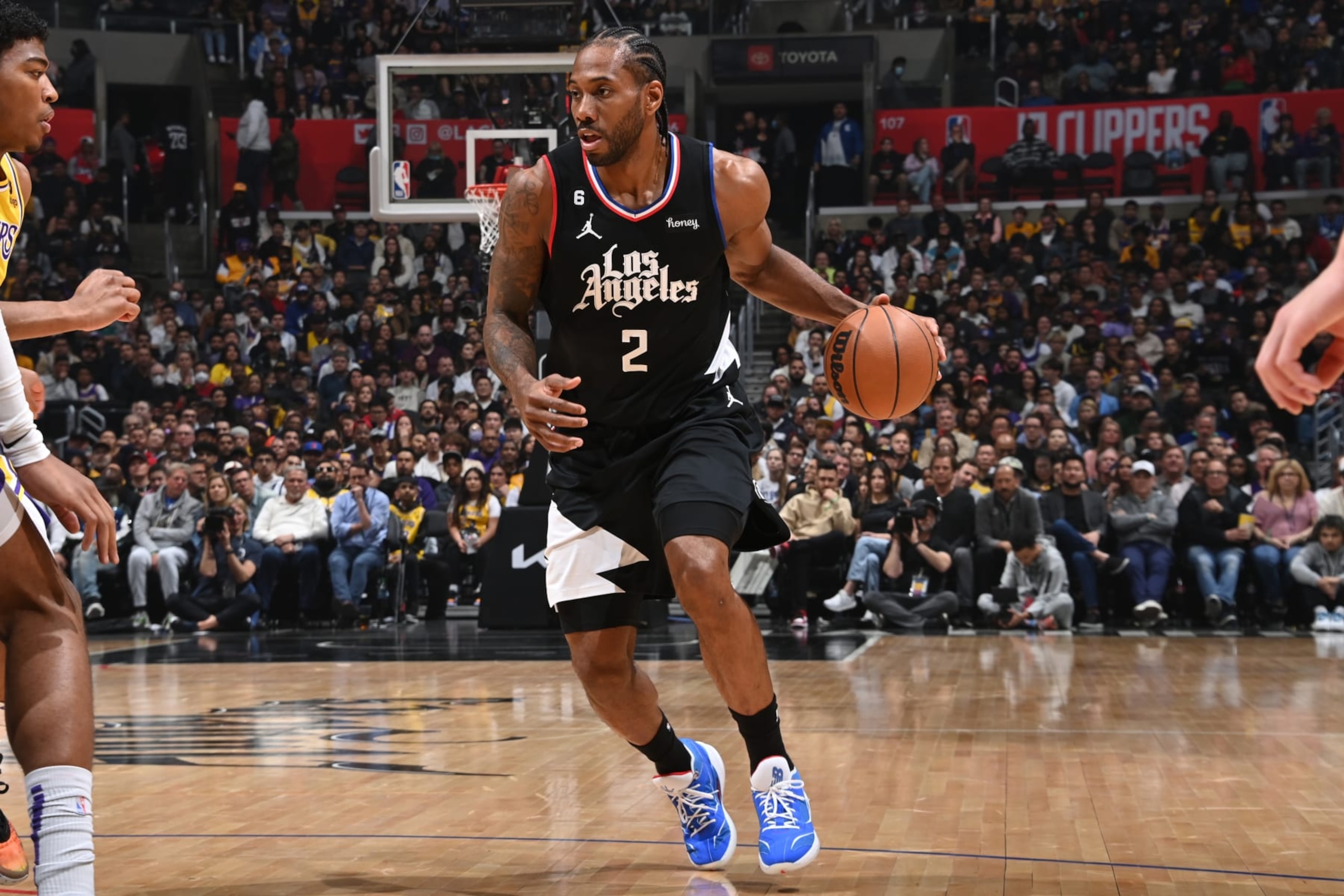 LOS ANGELES, CA - APRIL 5: Kawhi Leonard #2 of the LA Clippers dribbles the ball during the game against the Los Angeles Lakers on April 5, 2023 at Crypto.Com Arena in Los Angeles, California. NOTE TO USER: User expressly acknowledges and agrees that, by downloading and/or using this Photograph, user is consenting to the terms and conditions of the Getty Images License Agreement. Mandatory Copyright Notice: Copyright 2023 NBAE (Photo by Andrew D. Bernstein/NBAE via Getty Images)