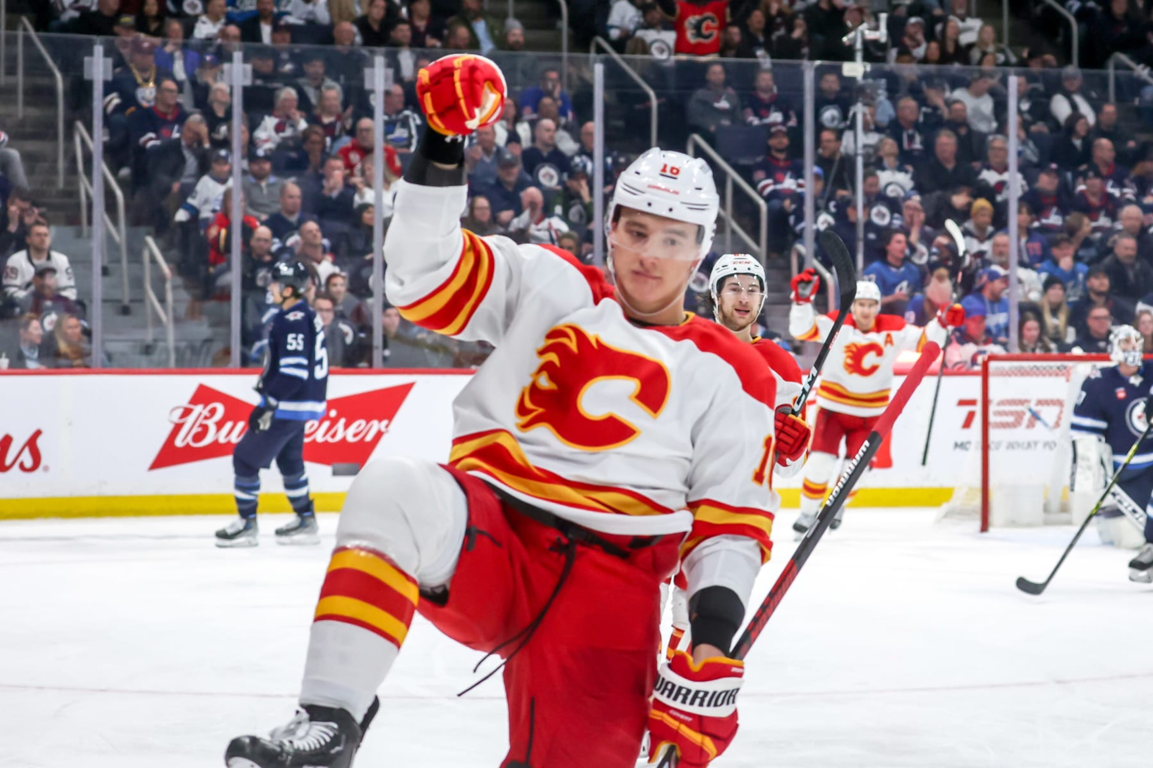 WINNIPEG, CANADA - APRIL 5: Nikita Zadorov #16 of the Calgary Flames celebrates after scoring a third period goal against the Winnipeg Jets at the Canada Life Centre on April 5, 2023 in Winnipeg, Manitoba, Canada. (Photo by Jonathan Kozub/NHLI via Getty Images)