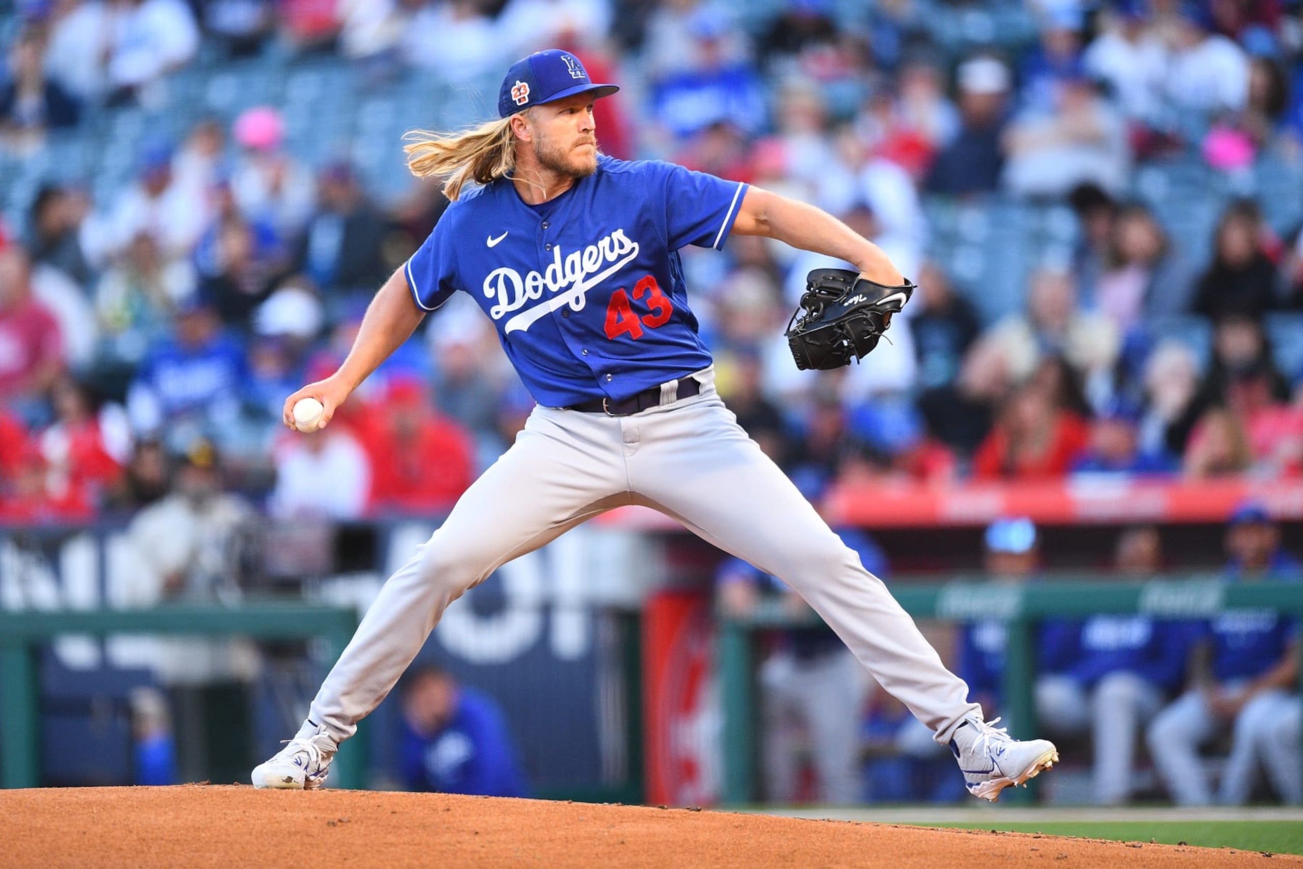 ANAHEIM, CA - MARCH 27: Los Angeles Dodgers pitcher Noah Syndergaard (43) throws a pitch during the MLB Spring Training game between the Los Angeles Dodgers and the Los Angeles Angels of Anaheim on March 27, 2023 at Angel Stadium of Anaheim in Anaheim, CA. (Photo by Brian Rothmuller/Icon Sportswire via Getty Images)