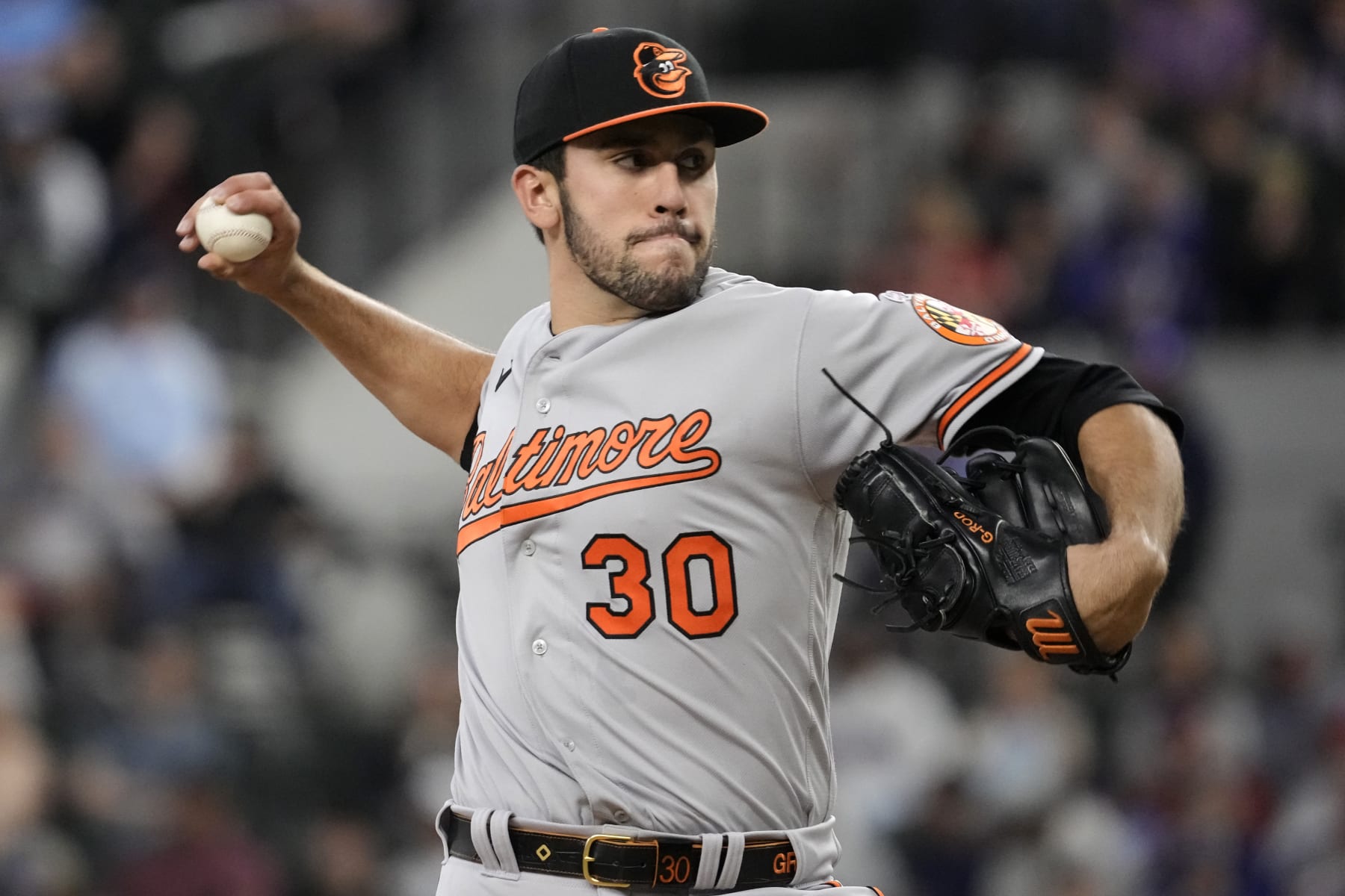 ARLINGTON, TEXAS - APRIL 05: Grayson Rodriguez #30 of the Baltimore Orioles throws a pitch during the fourth inning of his Major League debut against the Texas Rangers at Globe Life Field on April 05, 2023 in Arlington, Texas. (Photo by Sam Hodde/Getty Images)