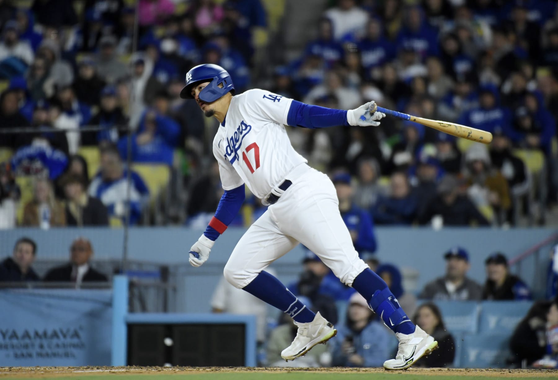 LOS ANGELES, CA - APRIL 03: Miguel Vargas #17 of the Los Angeles Dodgers hits a one run single to score James Outman #33 against relief pitcher Jake Bird #59 of the Colorado Rockies during the fifth inning at Dodger Stadium on April 3, 2023 in Los Angeles, California. (Photo by Kevork Djansezian/Getty Images)