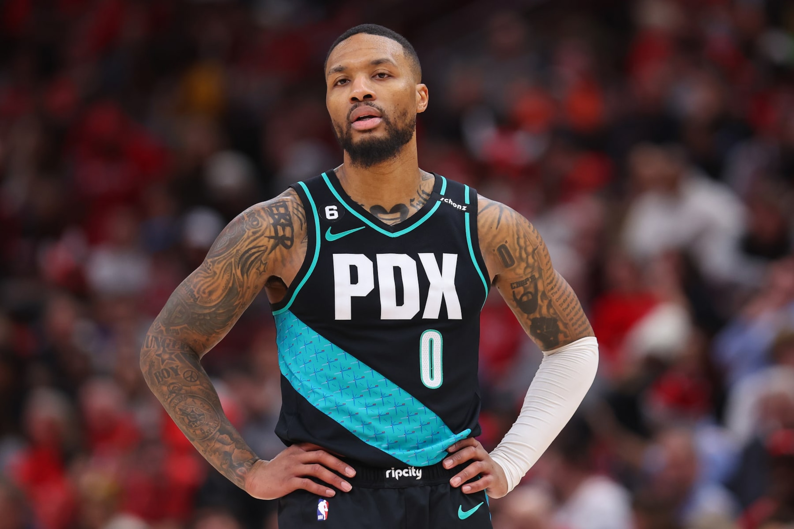 CHICAGO, ILLINOIS - FEBRUARY 04: Damian Lillard #0 of the Portland Trail Blazers looks on against the Chicago Bulls during the first half at United Center on February 04, 2023 in Chicago, Illinois. NOTE TO USER: User expressly acknowledges and agrees that, by downloading and or using this photograph, User is consenting to the terms and conditions of the Getty Images License Agreement. (Photo by Michael Reaves/Getty Images) CHICAGO, ILLINOIS - FEBRUARY 04: Damian Lillard #0 of the Portland Trail Blazers looks on against the Chicago Bulls during the first half at United Center on February 04, 2023 in Chicago, Illinois. NOTE TO USER: User expressly acknowledges and agrees that, by downloading and or using this photograph, User is consenting to the terms and conditions of the Getty Images License Agreement. (Photo by Michael Reaves/Getty Images)