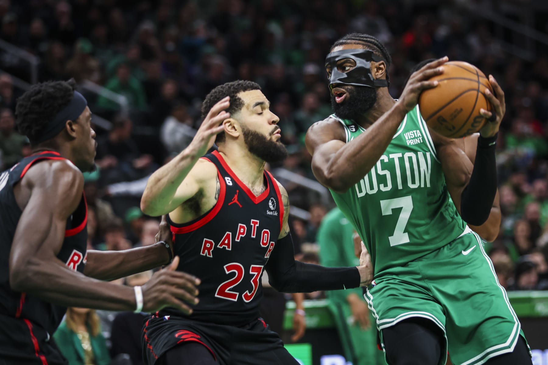 Boston, MA - April 5: Boston Celtics SG Jaylen Brown drives into Toronto Raptors SG Fred VanVleet in the first quarter. The Celtics defeated the Raptors, 97-93. (Photo by Erin Clark/The Boston Globe via Getty Images)
