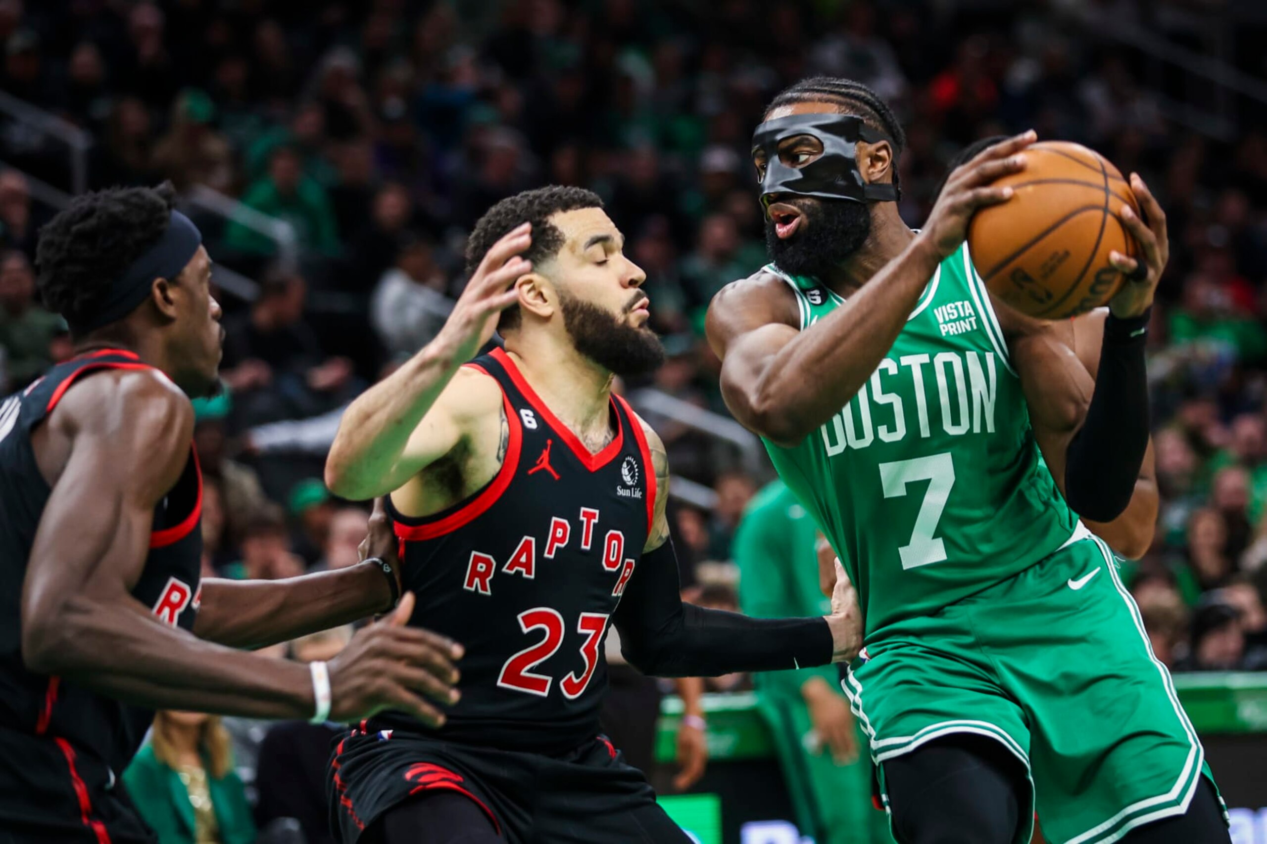 Boston, MA - April 5: Boston Celtics SG Jaylen Brown drives into Toronto Raptors SG Fred VanVleet in the first quarter. The Celtics defeated the Raptors, 97-93. (Photo by Erin Clark/The Boston Globe via Getty Images)