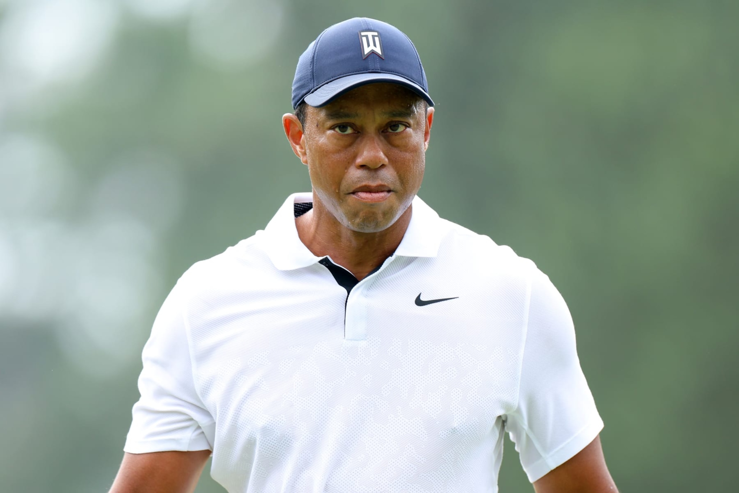 AUGUSTA, GEORGIA - APRIL 06: Tiger Woods of the United States reacts on the eighth green during the first round of the 2023 Masters Tournament at Augusta National Golf Club on April 06, 2023 in Augusta, Georgia. (Photo by Andrew Redington/Getty Images) AUGUSTA, GEORGIA - APRIL 06: Tiger Woods of the United States reacts on the eighth green during the first round of the 2023 Masters Tournament at Augusta National Golf Club on April 06, 2023 in Augusta, Georgia. (Photo by Andrew Redington/Getty Images)