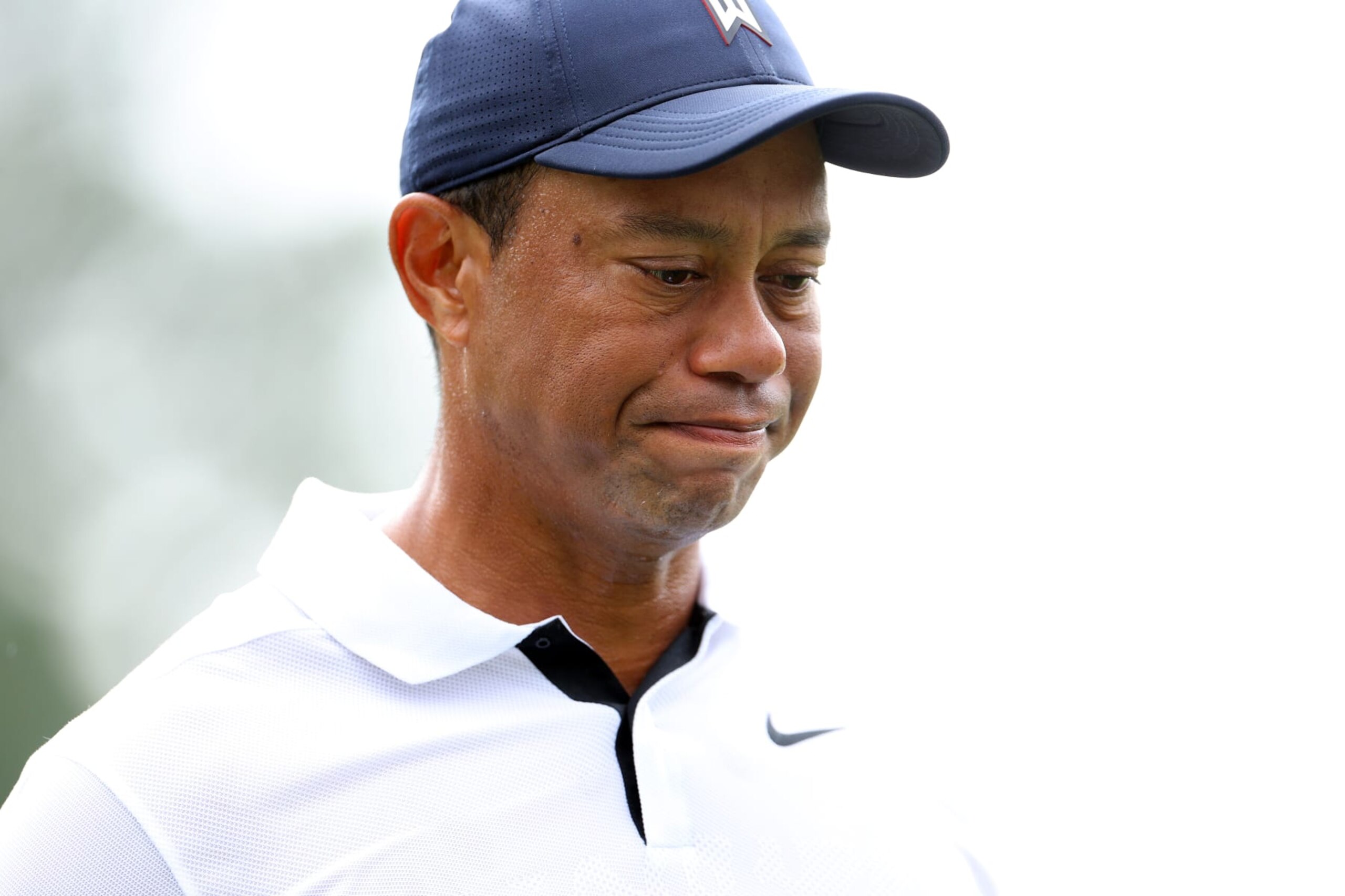 AUGUSTA, GEORGIA - APRIL 06: Tiger Woods of the United States reacts on the first hole during the first round of the 2023 Masters Tournament at Augusta National Golf Club on April 06, 2023 in Augusta, Georgia. (Photo by Andrew Redington/Getty Images)