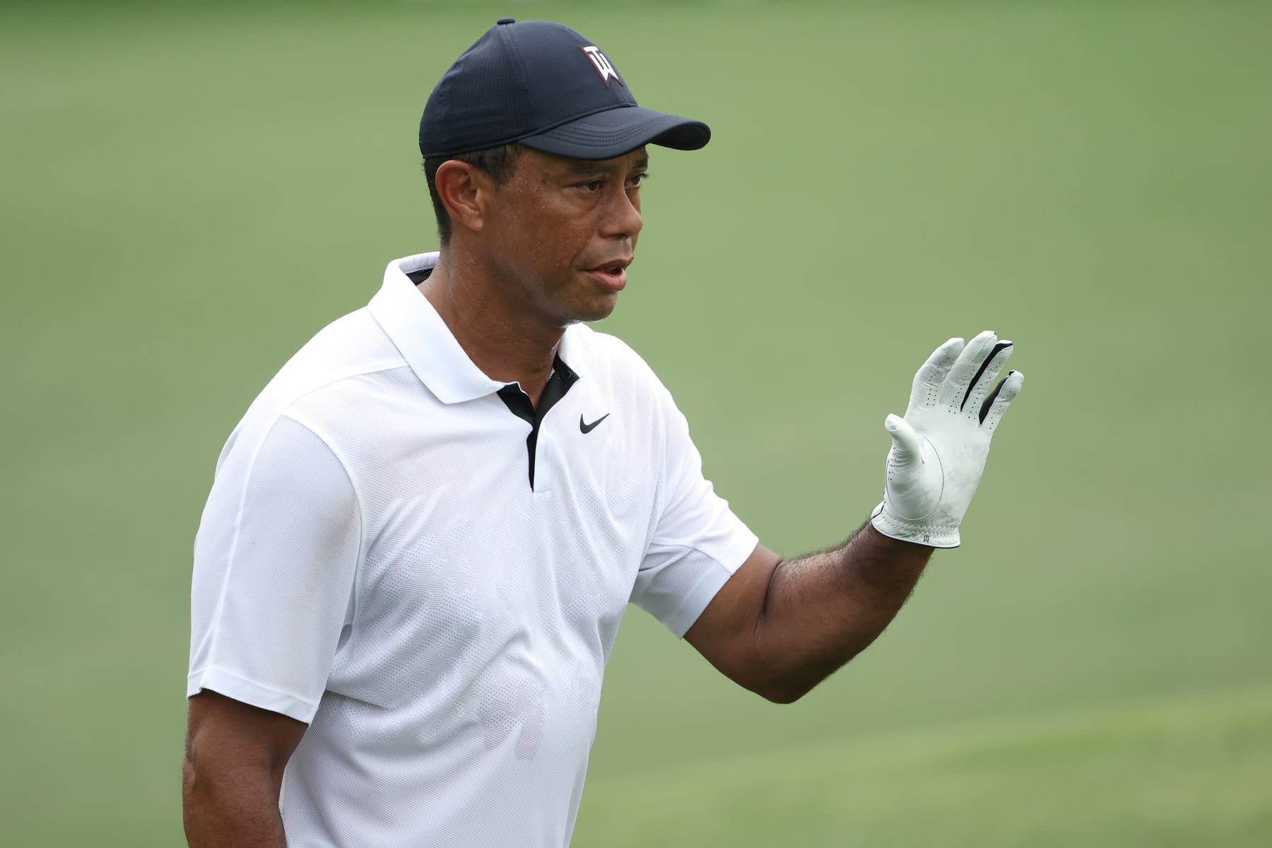 AUGUSTA, GEORGIA - APRIL 06: Tiger Woods of the United States walks on the 18th hole during the first round of the 2023 Masters Tournament at Augusta National Golf Club on April 06, 2023 in Augusta, Georgia. (Photo by Patrick Smith/Getty Images)