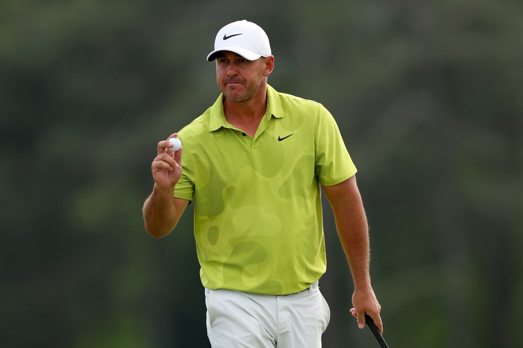 AUGUSTA, GEORGIA - APRIL 06: Brooks Koepka of the United States reacts to his birdie on the 18th green during the first round of the 2023 Masters Tournament at Augusta National Golf Club on April 06, 2023 in Augusta, Georgia. (Photo by Andrew Redington/Getty Images)