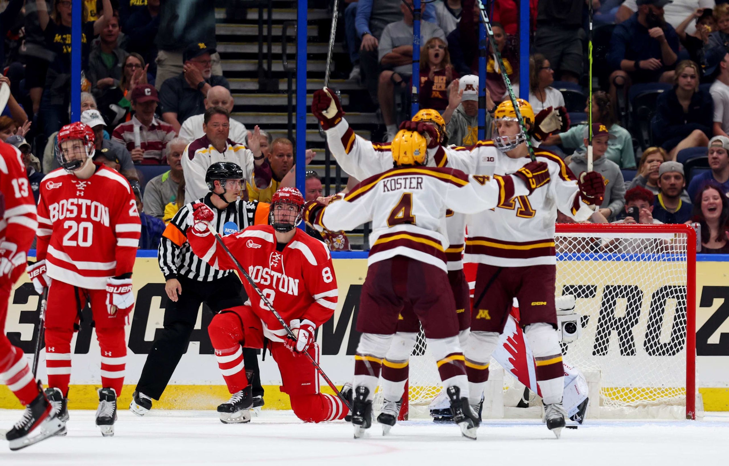 TAMPA, FLORIDA - APRIL 06: Mike Koster #4 of the Minnesota celebrates a goal in the first period during a semifinal of the 2023 Frozen Four against the Boston University at Amalie Arena on April 06, 2023 in Tampa, Florida. (Photo by Mike Ehrmann/Getty Images) TAMPA, FLORIDA - APRIL 06: Mike Koster #4 of the Minnesota celebrates a goal in the first period during a semifinal of the 2023 Frozen Four against the Boston University at Amalie Arena on April 06, 2023 in Tampa, Florida. (Photo by Mike Ehrmann/Getty Images)