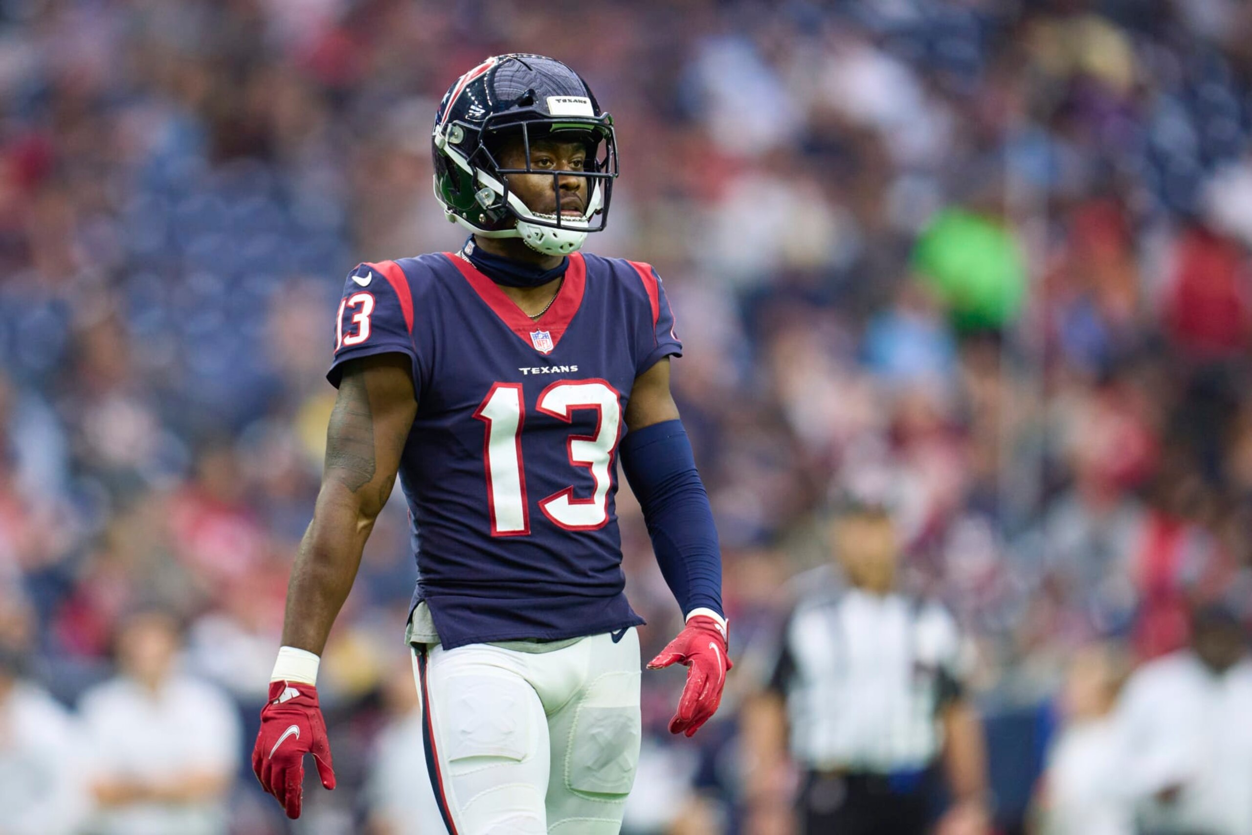 HOUSTON, TX - JANUARY 01: Brandin Cooks #13 of the Houston Texans walks towards the huddle against the Jacksonville Jaguars during the second half at NRG Stadium on January 1, 2023 in Houston, Texas. (Photo by Cooper Neill/Getty Images) HOUSTON, TX - JANUARY 01: Brandin Cooks #13 of the Houston Texans walks towards the huddle against the Jacksonville Jaguars during the second half at NRG Stadium on January 1, 2023 in Houston, Texas. (Photo by Cooper Neill/Getty Images)