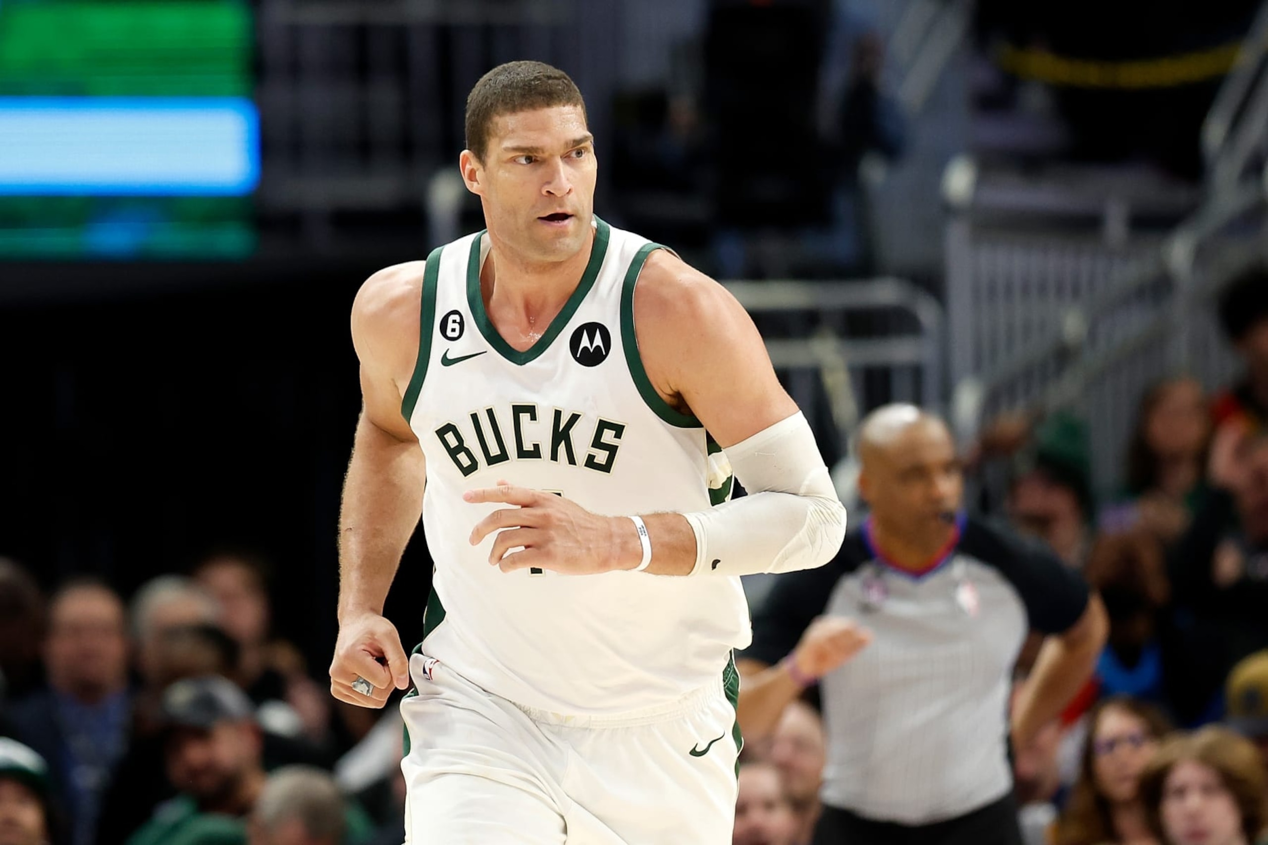 MILWAUKEE, WISCONSIN - MARCH 19: Brook Lopez #11 of the Milwaukee Bucks runs down court during the second half of the game against the Toronto Raptors at Fiserv Forum on March 19, 2023 in Milwaukee, Wisconsin. NOTE TO USER: User expressly acknowledges and agrees that, by downloading and or using this photograph, User is consenting to the terms and conditions of the Getty Images License Agreement. (Photo by John Fisher/Getty Images)