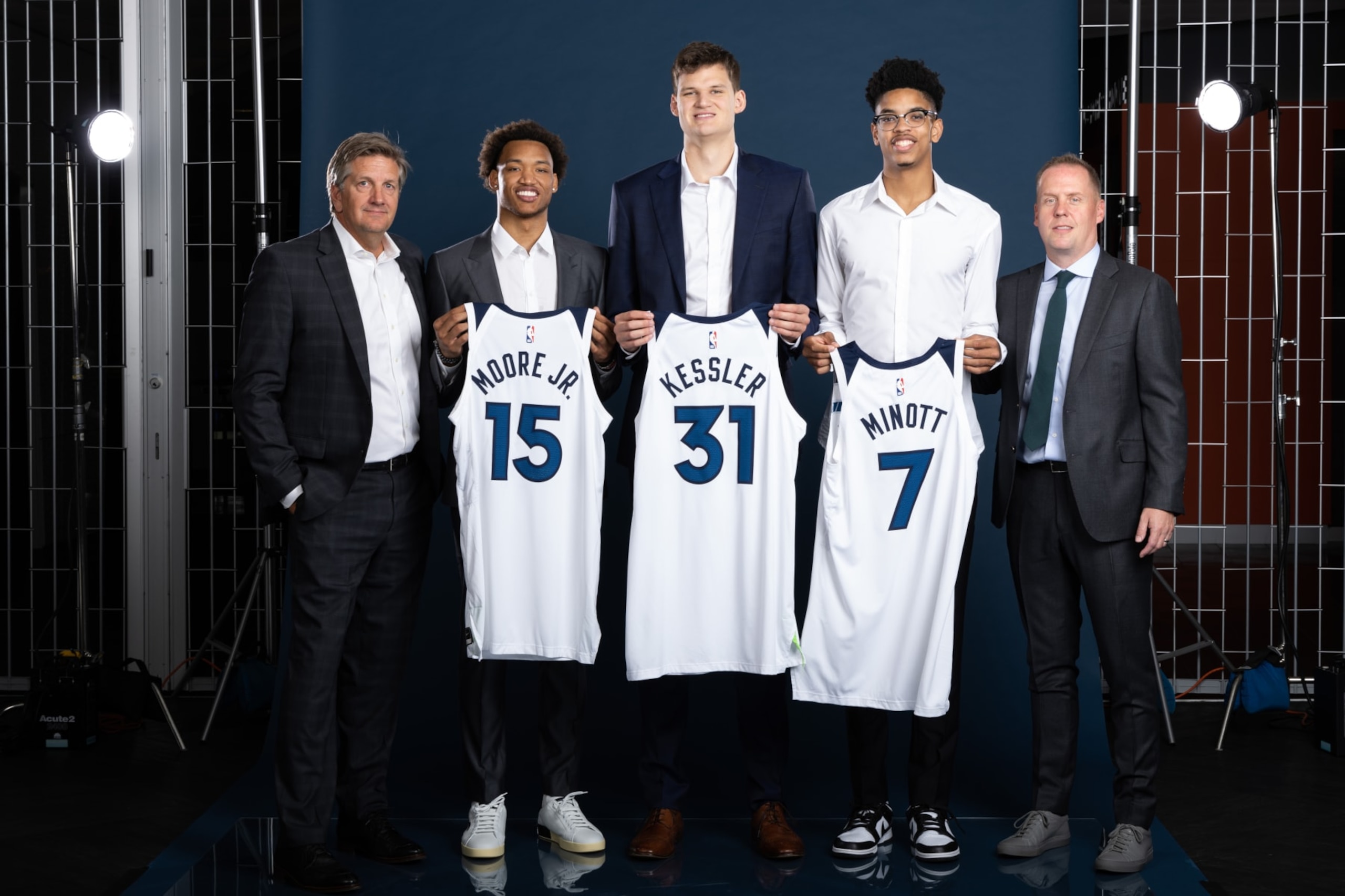 MINNEAPOLIS, MN - JUNE 28:  President of Basketball Operations Tim Connelly, Head Coach Chris Finch of the Minnesota Timberwolves, Walker Kessler, Wendell Moore Jr. and Josh Minott pose for a portrait on June 28, 2022 at the Minnesota Timberwolves and Lynx Courts at Mayo Clinic Square in Minneapolis, Minnesota.  NOTE TO USER:  User expressly acknowledges and agrees that, by downloading and or using this Photograph, user is consenting to the terms and conditions of the Getty Images License Agreement. Mandatory Copyright Notice: Copyright 2022 NBAE (Photo by David Sherman/NBAE via Getty Images)