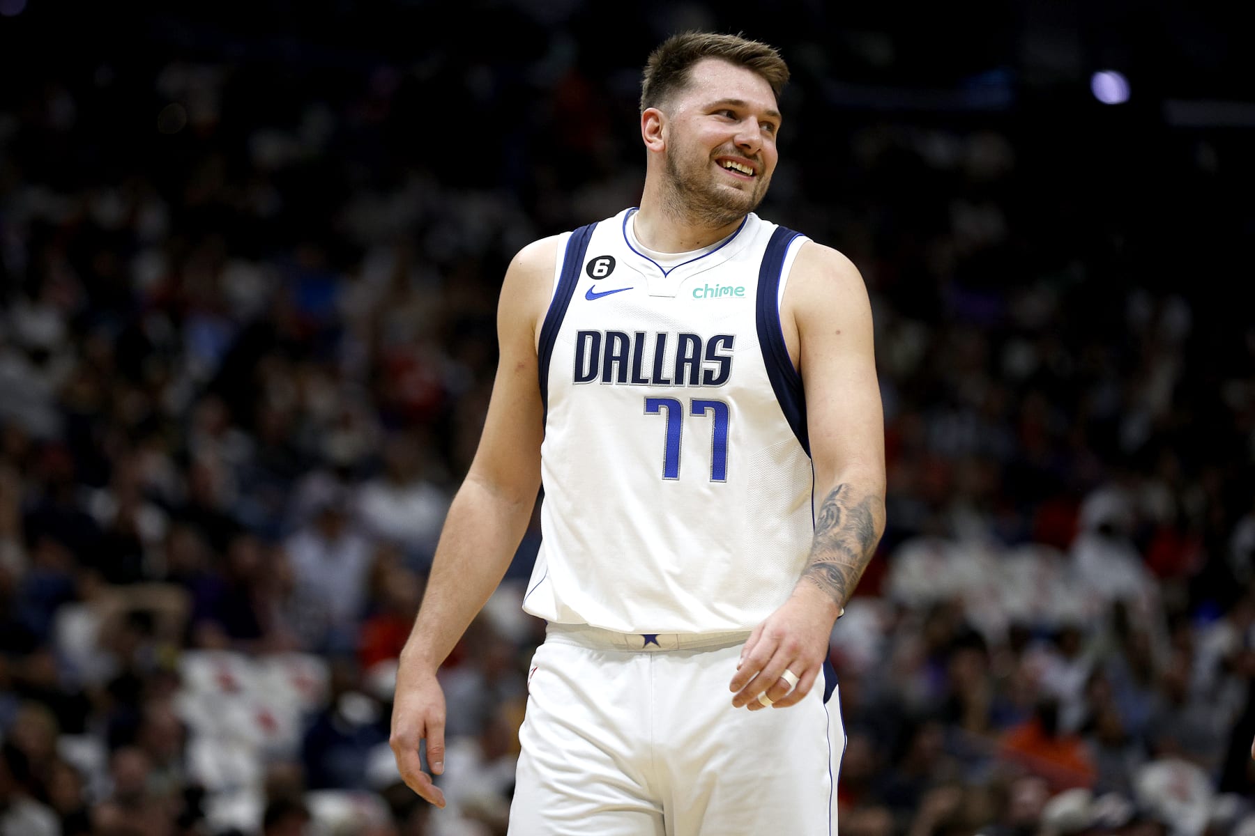 NEW ORLEANS, LOUISIANA - MARCH 08: Luka Doncic #77 of the Dallas Mavericks reacts to a call during the first quarter of an NBA game against the New Orleans Pelicans at Smoothie King Center on March 08, 2023 in New Orleans, Louisiana. NOTE TO USER: User expressly acknowledges and agrees that, by downloading and or using this photograph, User is consenting to the terms and conditions of the Getty Images License Agreement. (Photo by Sean Gardner/Getty Images)