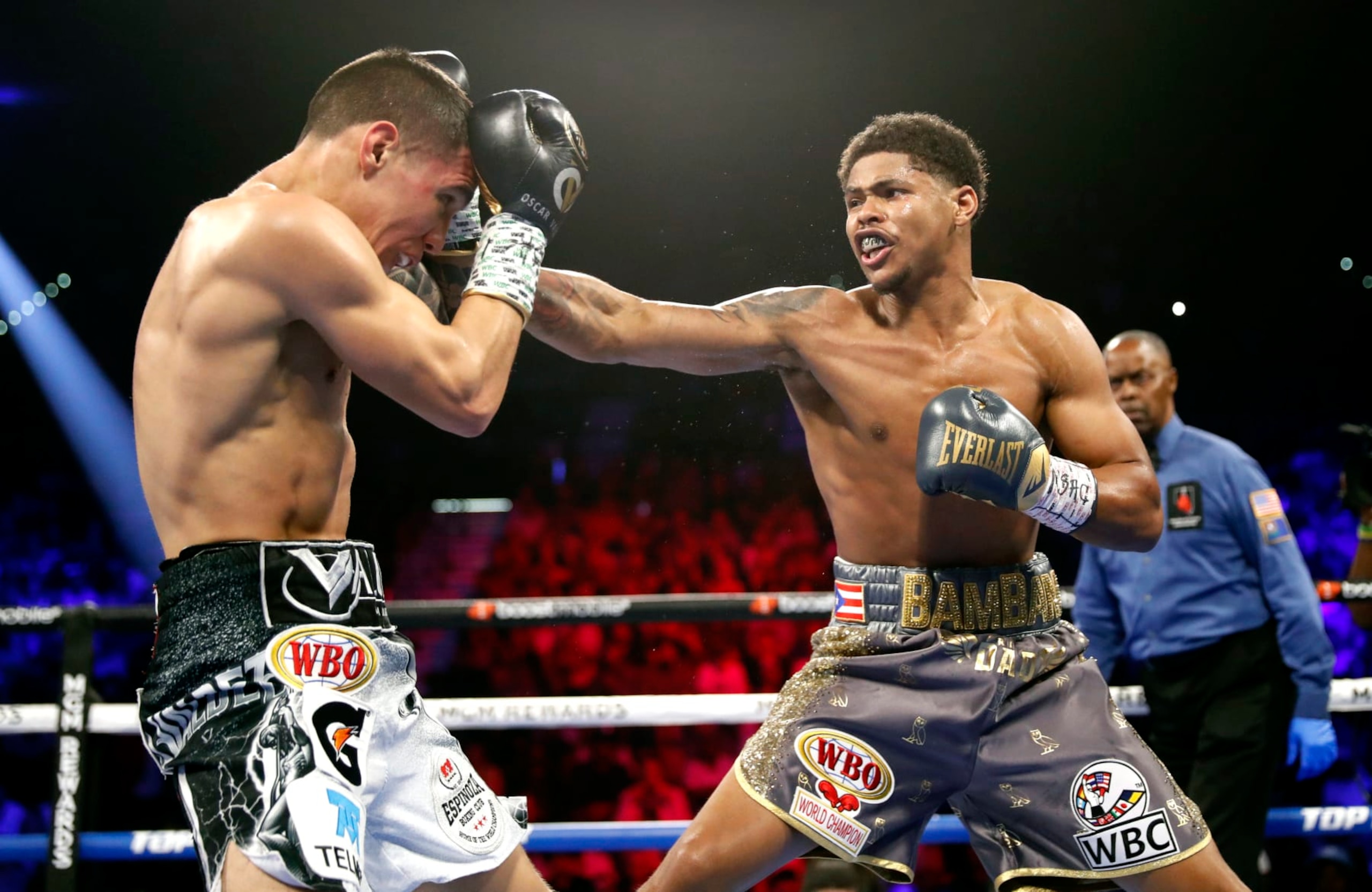 LAS VEGAS, NEVADA - APRIL 30:  WBO junior lightweight champion Shakur Stevenson (R) punches WBC champion Oscar Valdez during a title unification fight at MGM Grand Garden Arena on April 30, 2022 in Las Vegas, Nevada. Stevenson took the WBC title by unanimous decision.  (Photo by Steve Marcus/Getty Images)