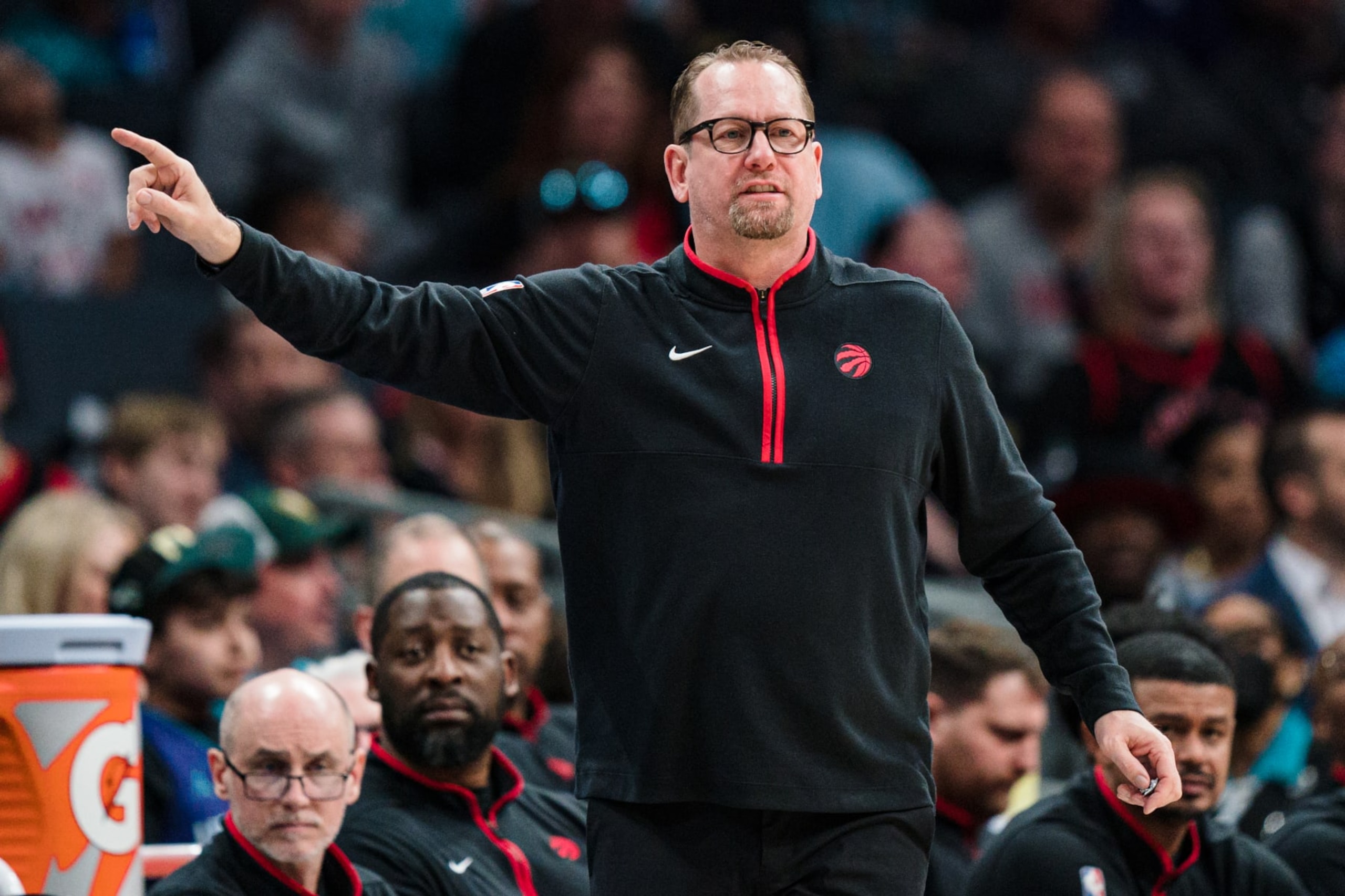 CHARLOTTE, NORTH CAROLINA - APRIL 02: Head coach Nick Nurse of the Toronto Raptors looks on in the first quarter during their game against the Charlotte Hornets at Spectrum Center on April 02, 2023 in Charlotte, North Carolina. NOTE TO USER: User expressly acknowledges and agrees that, by downloading and or using this photograph, User is consenting to the terms and conditions of the Getty Images License Agreement. (Photo by Jacob Kupferman/Getty Images)