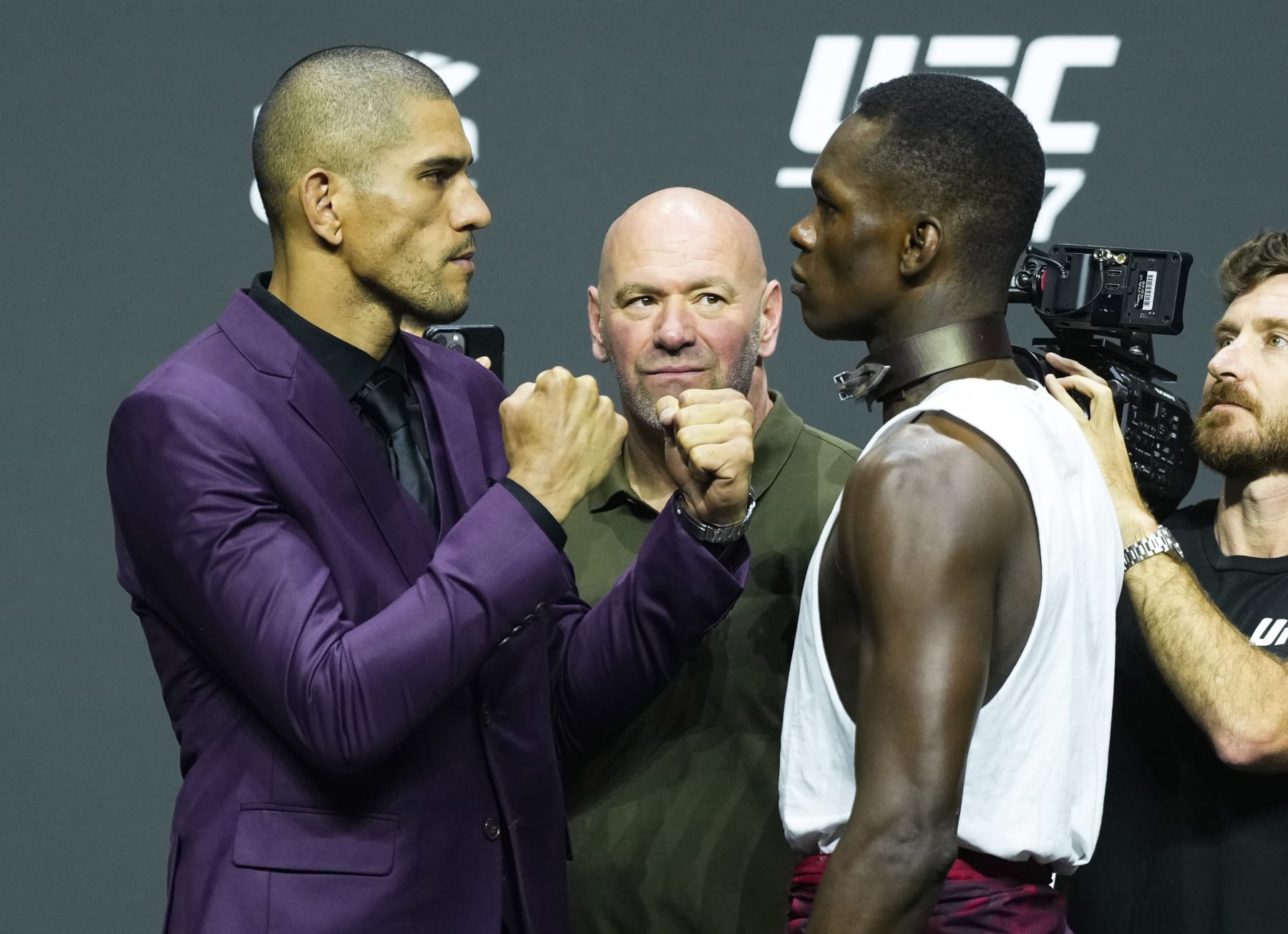 MIAMI, FLORIDA - APRIL 06: (L-R) Opponents Alex Pereira of Brazil and Israel Adesanya of Nigeria face off during the UFC 287 press conference at Miami-Dade Arena on April 06, 2023 in Miami, Florida. (Photo by Jeff Bottari/Zuffa LLC via Getty Images)