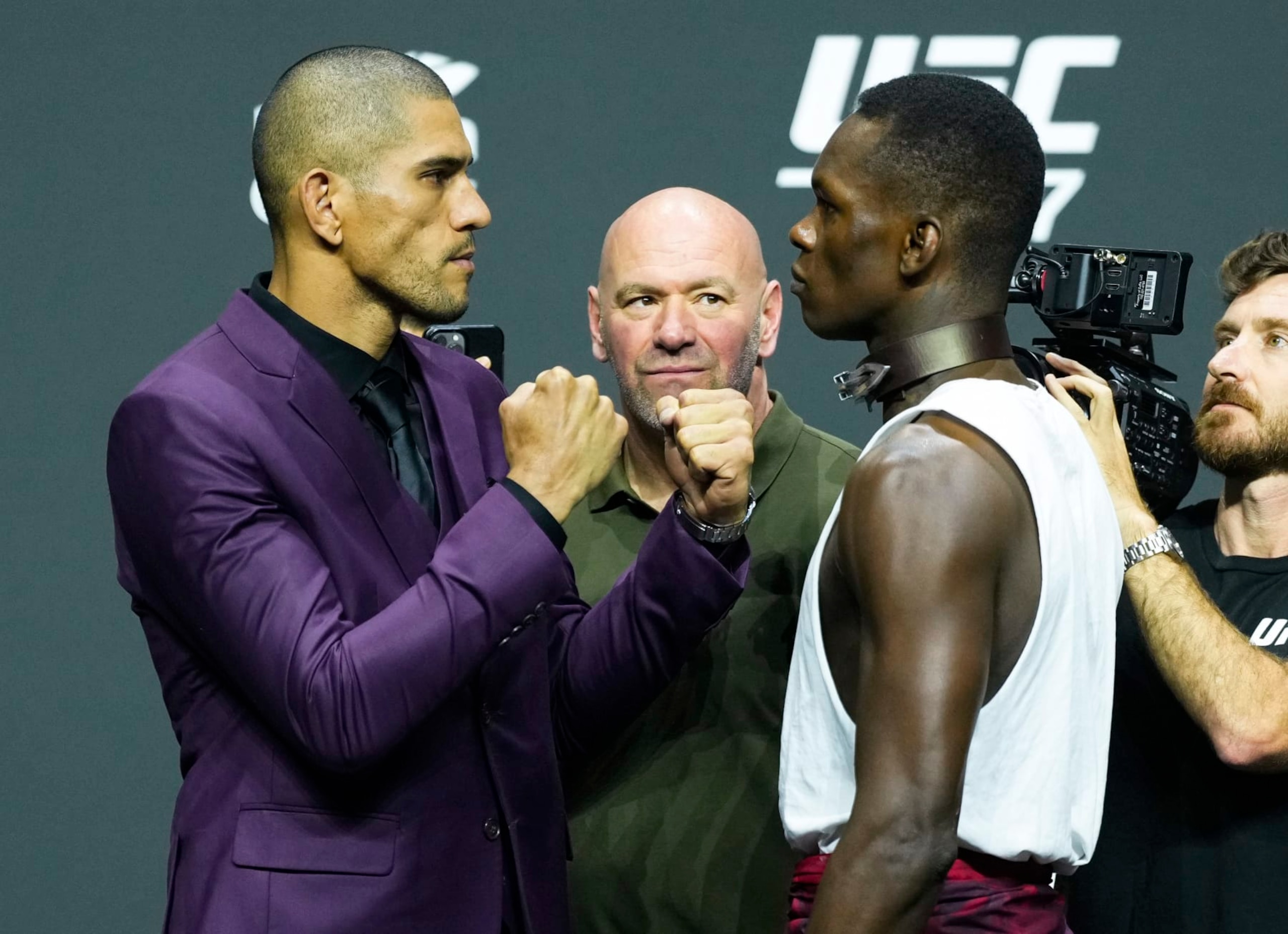 MIAMI, FLORIDA - APRIL 06: (L-R) Opponents Alex Pereira of Brazil and Israel Adesanya of Nigeria face off during the UFC 287 press conference at Miami-Dade Arena on April 06, 2023 in Miami, Florida. (Photo by Jeff Bottari/Zuffa LLC via Getty Images)