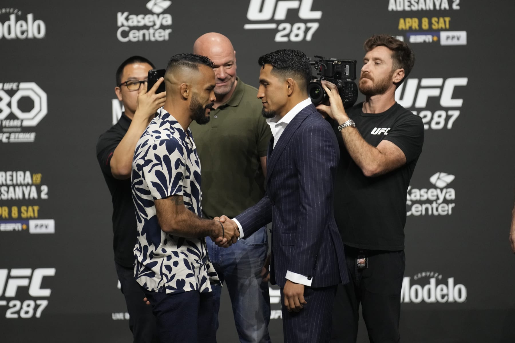 MIAMI, FLORIDA - APRIL 06: (L-R) Rob Font and Adrian Yanez face off for the press and the fans during a press conference for UFC 287, Pereira versus Adesanya 2, on April 6, 2023, at Kaseya Center in Miami, FL. (Photo by Louis Grasse/PxImages/Icon Sportswire via Getty Images)