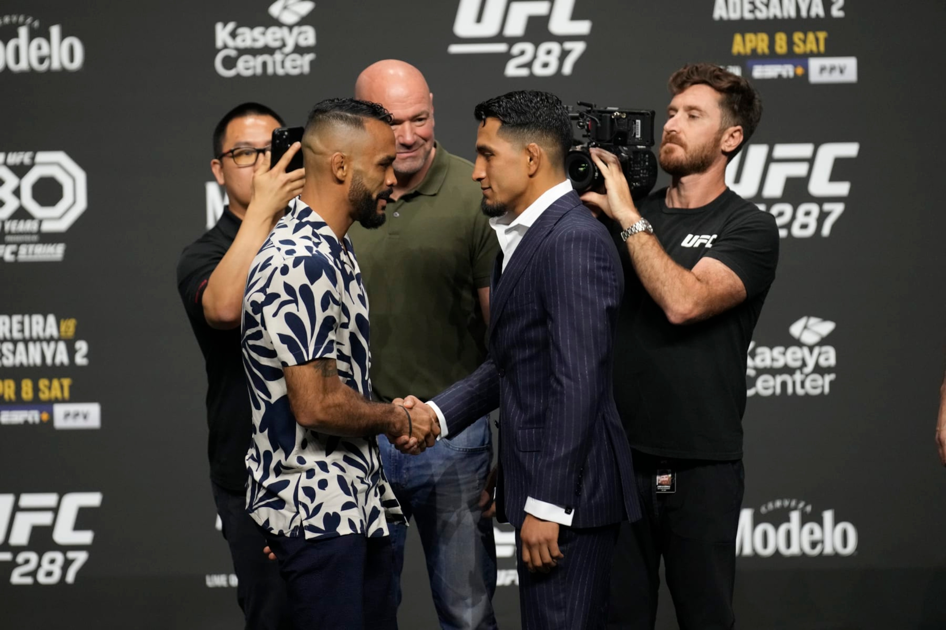 MIAMI, FLORIDA - APRIL 06: (L-R) Rob Font and Adrian Yanez face off for the press and the fans during a press conference for UFC 287, Pereira versus Adesanya 2, on April 6, 2023, at Kaseya Center in Miami, FL. (Photo by Louis Grasse/PxImages/Icon Sportswire via Getty Images)