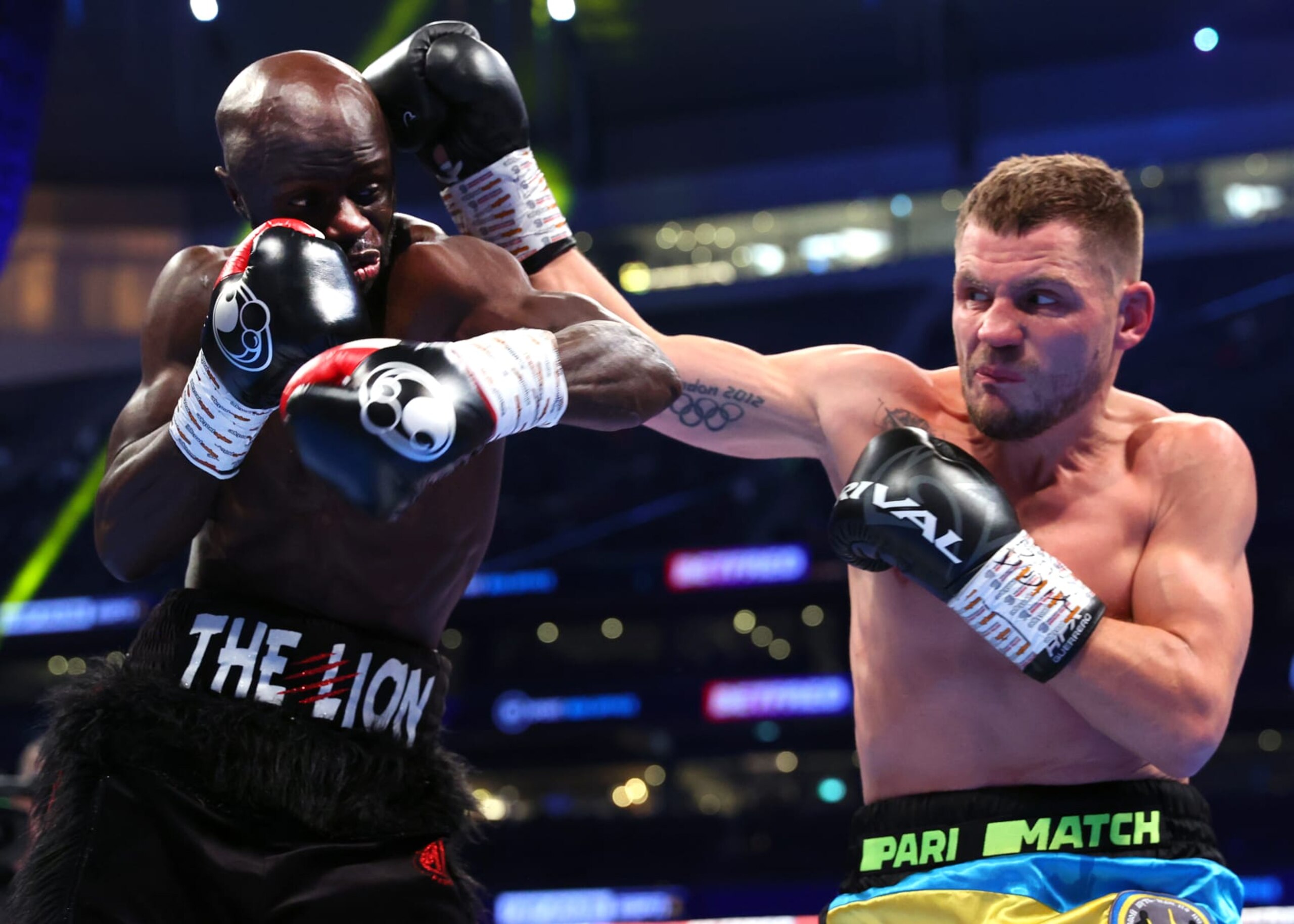 LONDON, ENGLAND - DECEMBER 03: Yvan Mendy (L) and Denys Berinchyk (R) exchange punches during their lightweight fight, at Tottenham Hotspur Stadium on December 03, 2022 in London, England. (Photo by Mikey Williams/Top Rank Inc via Getty Images) LONDON, ENGLAND - DECEMBER 03: Yvan Mendy (L) and Denys Berinchyk (R) exchange punches during their lightweight fight, at Tottenham Hotspur Stadium on December 03, 2022 in London, England. (Photo by Mikey Williams/Top Rank Inc via Getty Images)
