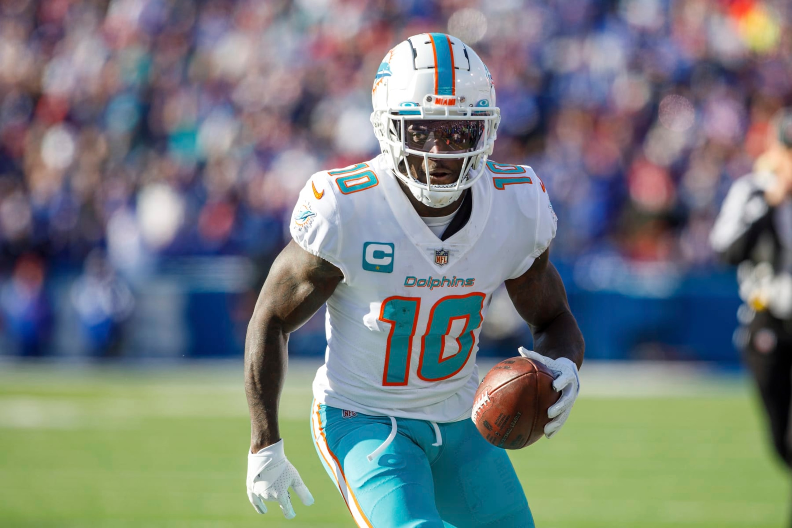 Miami Dolphins wide receiver Tyreek Hill (10) goes out of bounds after a catch during an NFL wild-card football game Sunday, Jan. 15, 2023, in Orchard Park, NY. (AP Photo/Matt Durisko) Miami Dolphins wide receiver Tyreek Hill (10) goes out of bounds after a catch during an NFL wild-card football game Sunday, Jan. 15, 2023, in Orchard Park, NY. (AP Photo/Matt Durisko)