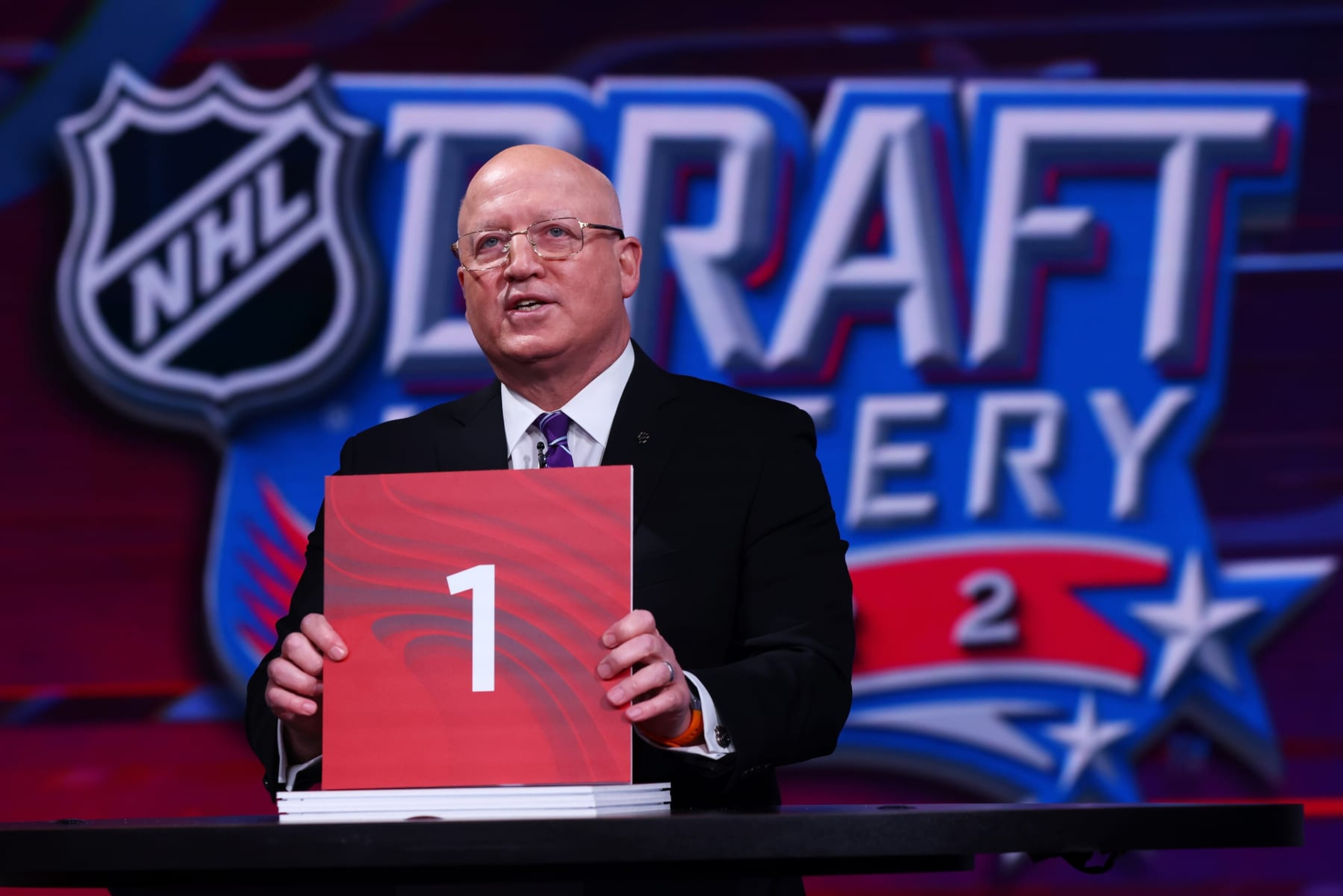 SECAUCUS, NEW JERSEY - MAY 10: National Hockey League Deputy Commissioner Bill Daly announces draft position during the 2022 NHL Draft Lottery on May 10, 2022 at the NHL Network's studio in Secaucus, New Jersey. (Photo by Mike Stobe/NHLI via Getty Images)