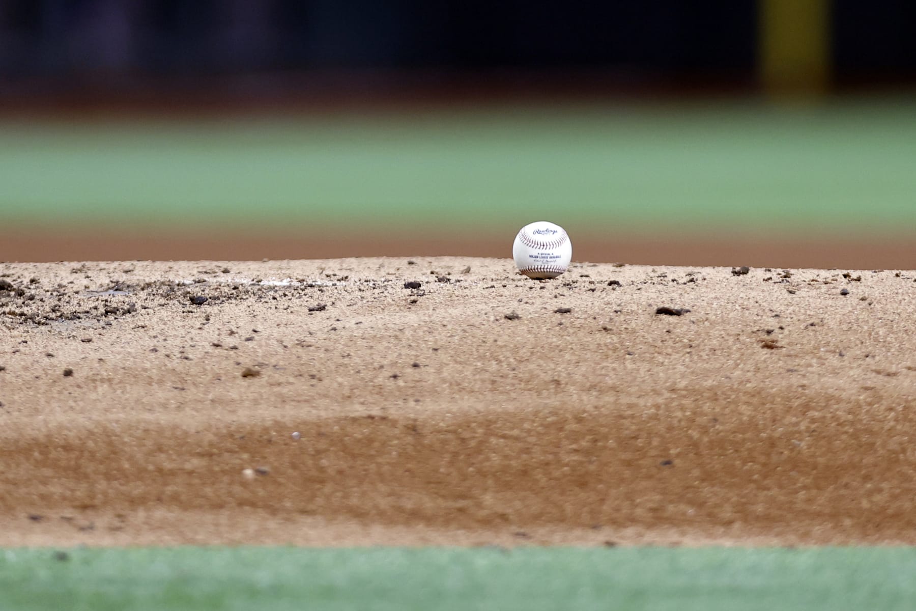 ARLINGTON, TEXAS - APRIL 04: A general view of a baseball on the mound during the game between the Texas Rangers and the Baltimore Orioles at Globe Life Field on April 04, 2023 in Arlington, Texas. (Photo by Tim Heitman/Getty Images)