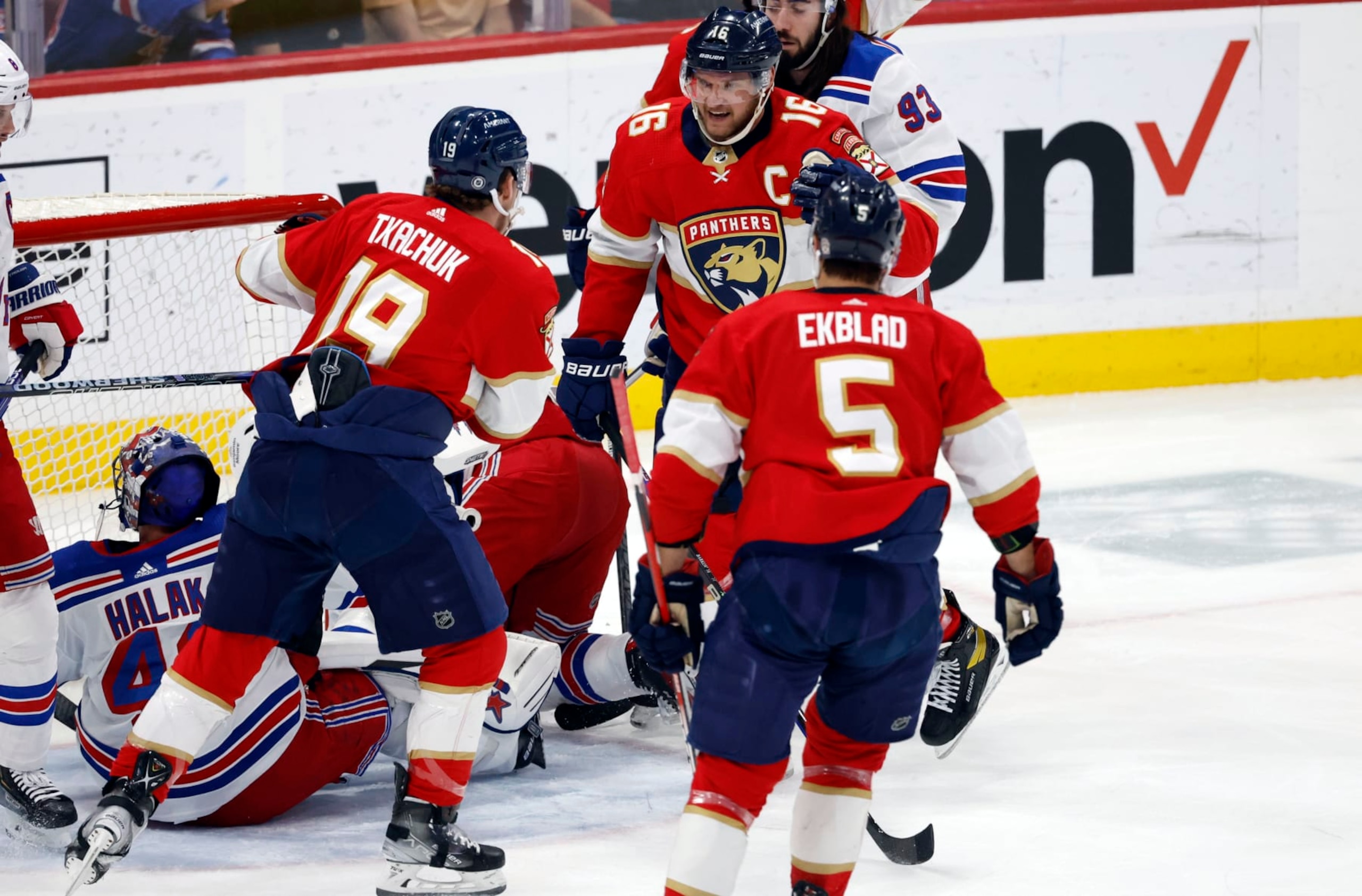 Florida Panthers center Aleksander Barkov (16), left wing Matthew Tkachuk (19) and defenseman Aaron Ekblad (5) celebrate after scoring against New York Rangers goaltender Jaroslav Halak (41) during the first period of an NHL hockey game Saturday, March 25, 2023, in Sunrise, Fla. (AP Photo/Rhona Wise)
