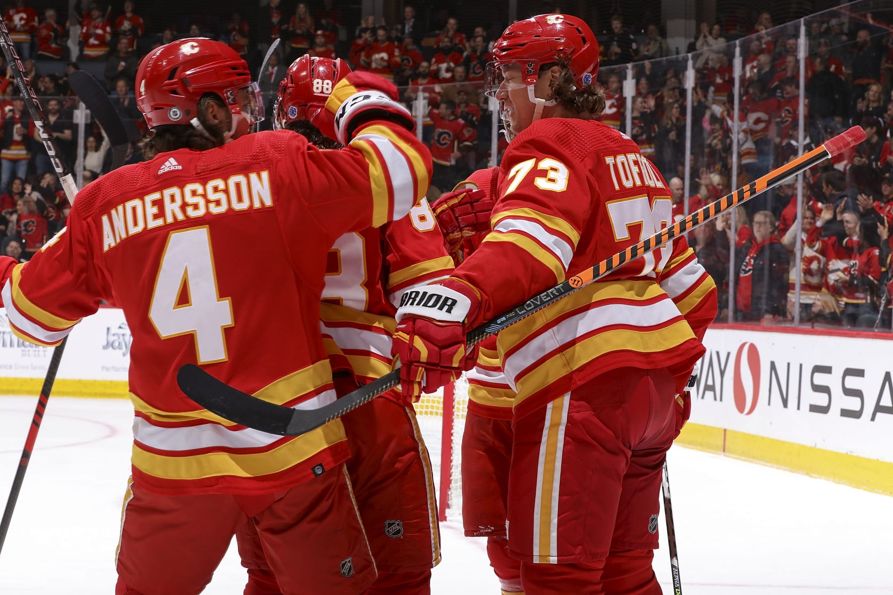 CALGARY, AB - APRIL 4: Tyler Toffoli #73 of the Calgary Flames celebrates with teammates after a goal against the Chicago Blackhawks at Scotiabank Saddledome on April 4, 2023 in Calgary, Alberta, Canada. (Photo by Gerry Thomas/NHLI via Getty Images)