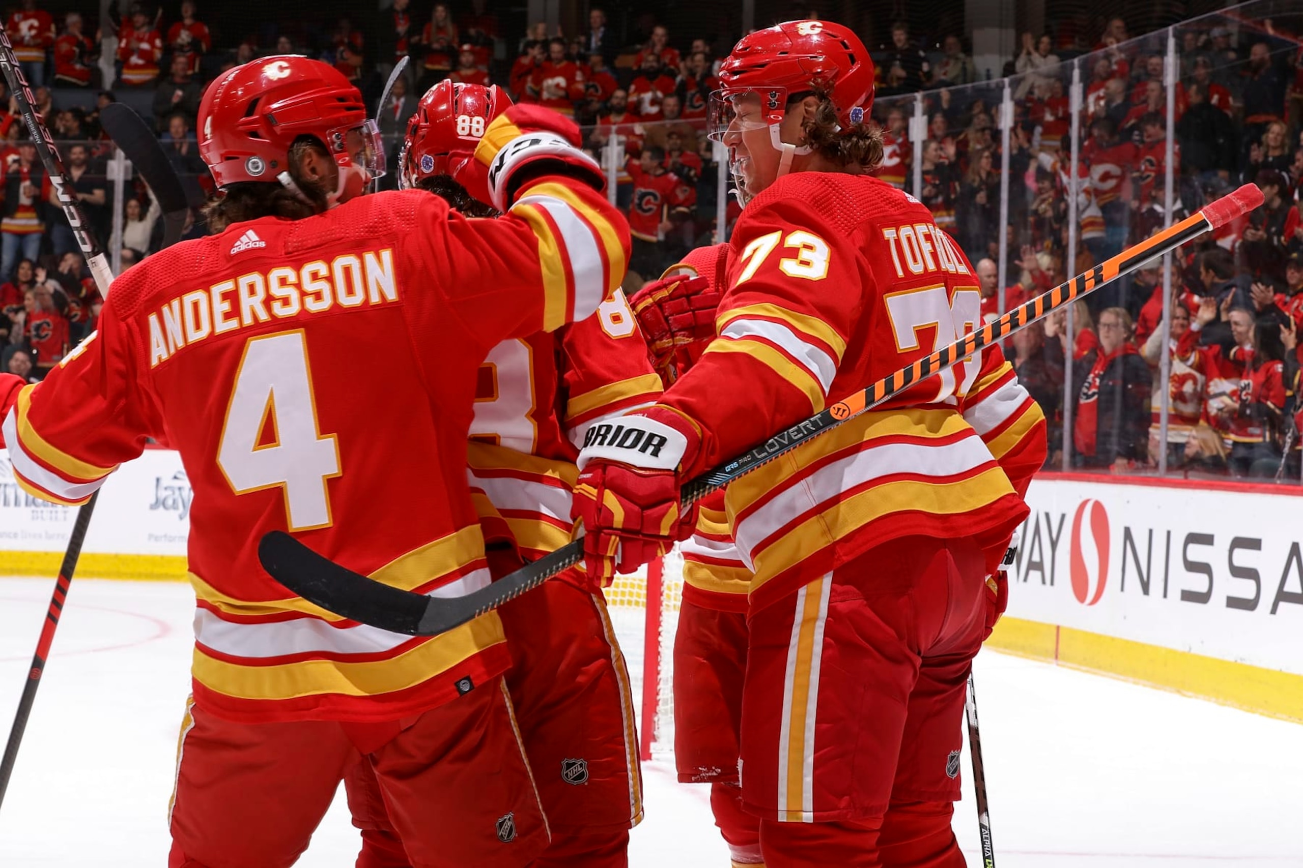 CALGARY, AB - APRIL 4: Tyler Toffoli #73 of the Calgary Flames celebrates with teammates after a goal against the Chicago Blackhawks at Scotiabank Saddledome on April 4, 2023 in Calgary, Alberta, Canada. (Photo by Gerry Thomas/NHLI via Getty Images)