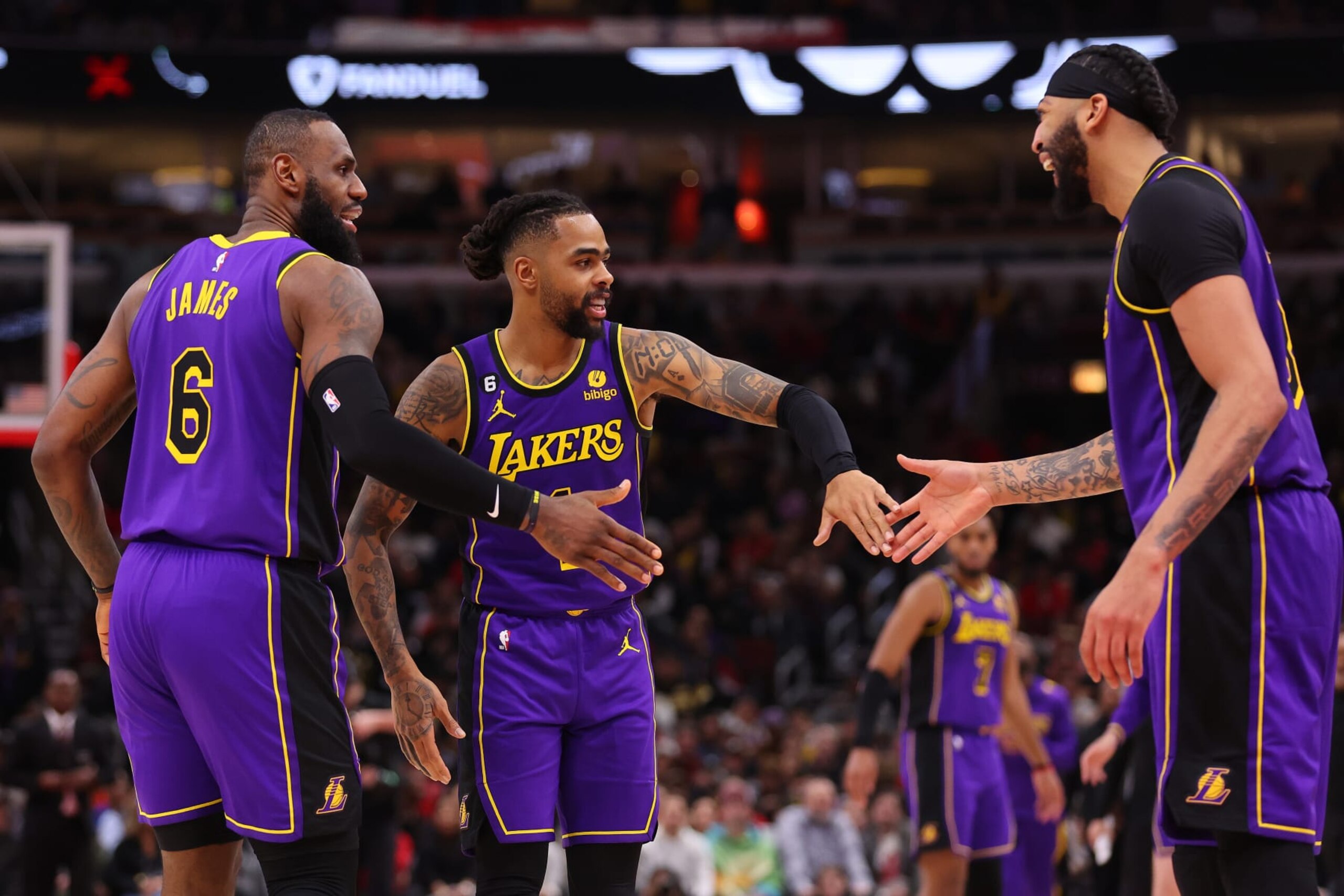 CHICAGO, ILLINOIS - MARCH 29: LeBron James #6, D'Angelo Russell #1 and Anthony Davis #3 of the Los Angeles Lakers celebrate against the Chicago Bulls during the second half at United Center on March 29, 2023 in Chicago, Illinois. NOTE TO USER: User expressly acknowledges and agrees that, by downloading and or using this photograph, User is consenting to the terms and conditions of the Getty Images License Agreement. (Photo by Michael Reaves/Getty Images) CHICAGO, ILLINOIS - MARCH 29: LeBron James #6, D'Angelo Russell #1 and Anthony Davis #3 of the Los Angeles Lakers celebrate against the Chicago Bulls during the second half at United Center on March 29, 2023 in Chicago, Illinois. NOTE TO USER: User expressly acknowledges and agrees that, by downloading and or using this photograph, User is consenting to the terms and conditions of the Getty Images License Agreement. (Photo by Michael Reaves/Getty Images)
