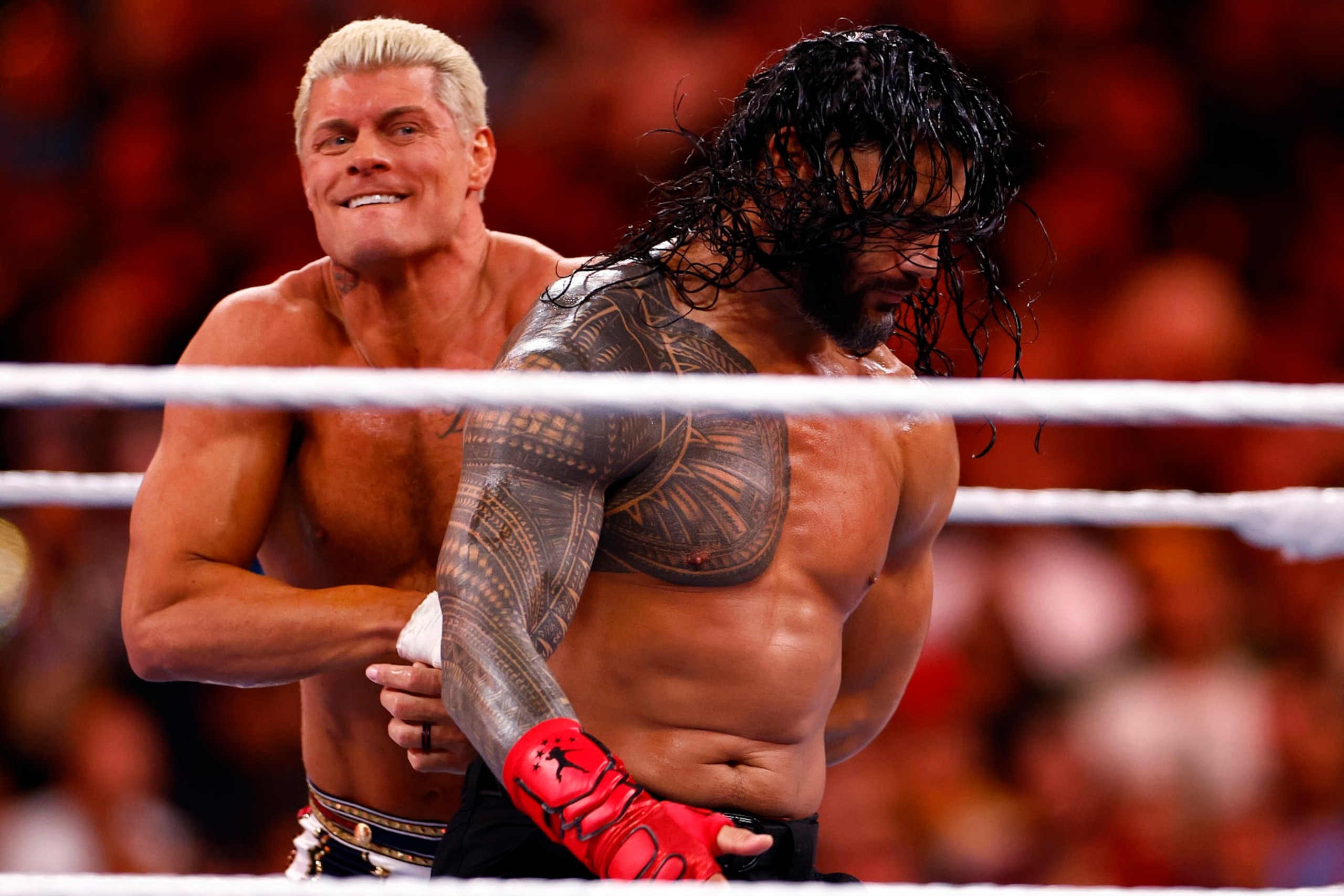 INGLEWOOD, CALIFORNIA - APRIL 02:  (L-R) Cody Rhodes wrestles Roman Reigns for Undisputed WWE Universal Title Match during WrestleMania Goes Hollywood at SoFi Stadium on April 02, 2023 in Inglewood, California.
 (Photo by Ronald Martinez/Getty Images)