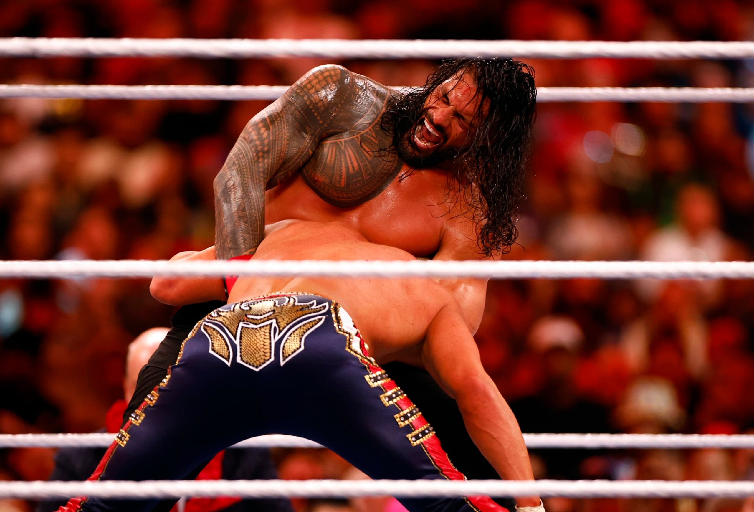 INGLEWOOD, CALIFORNIA - APRIL 02: (L-R) Roman Reigns wrestles Cody Rhodes for Undisputed WWE Universal Title Match during WrestleMania Goes Hollywood at SoFi Stadium on April 02, 2023 in Inglewood, California. (Photo by Ronald Martinez/Getty Images) INGLEWOOD, CALIFORNIA - APRIL 02: (L-R) Roman Reigns wrestles Cody Rhodes for Undisputed WWE Universal Title Match during WrestleMania Goes Hollywood at SoFi Stadium on April 02, 2023 in Inglewood, California. (Photo by Ronald Martinez/Getty Images)