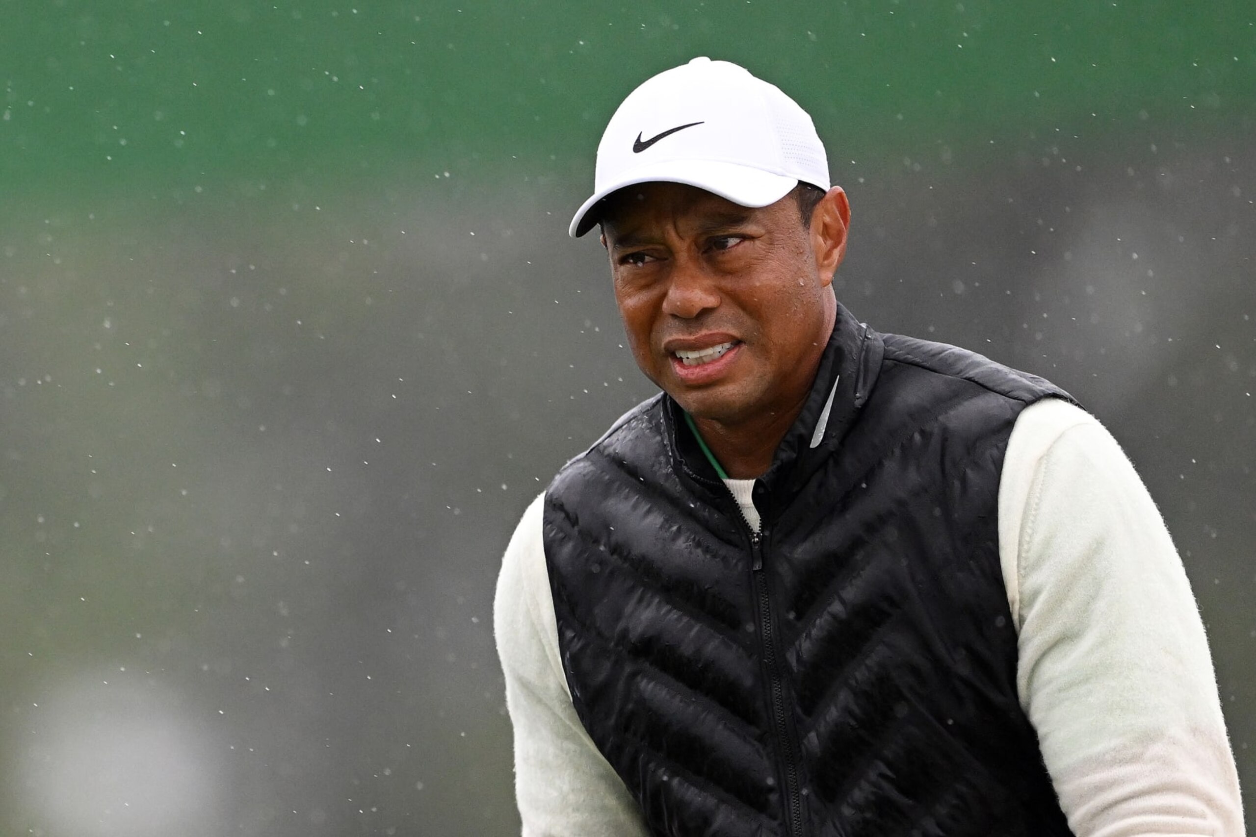 AUGUSTA, GEORGIA - APRIL 08: Tiger Woods of the United States looks on from the 18th green during the continuation of the weather delayed second round of the 2023 Masters Tournament at Augusta National Golf Club on April 08, 2023 in Augusta, Georgia. (Photo by Ross Kinnaird/Getty Images)