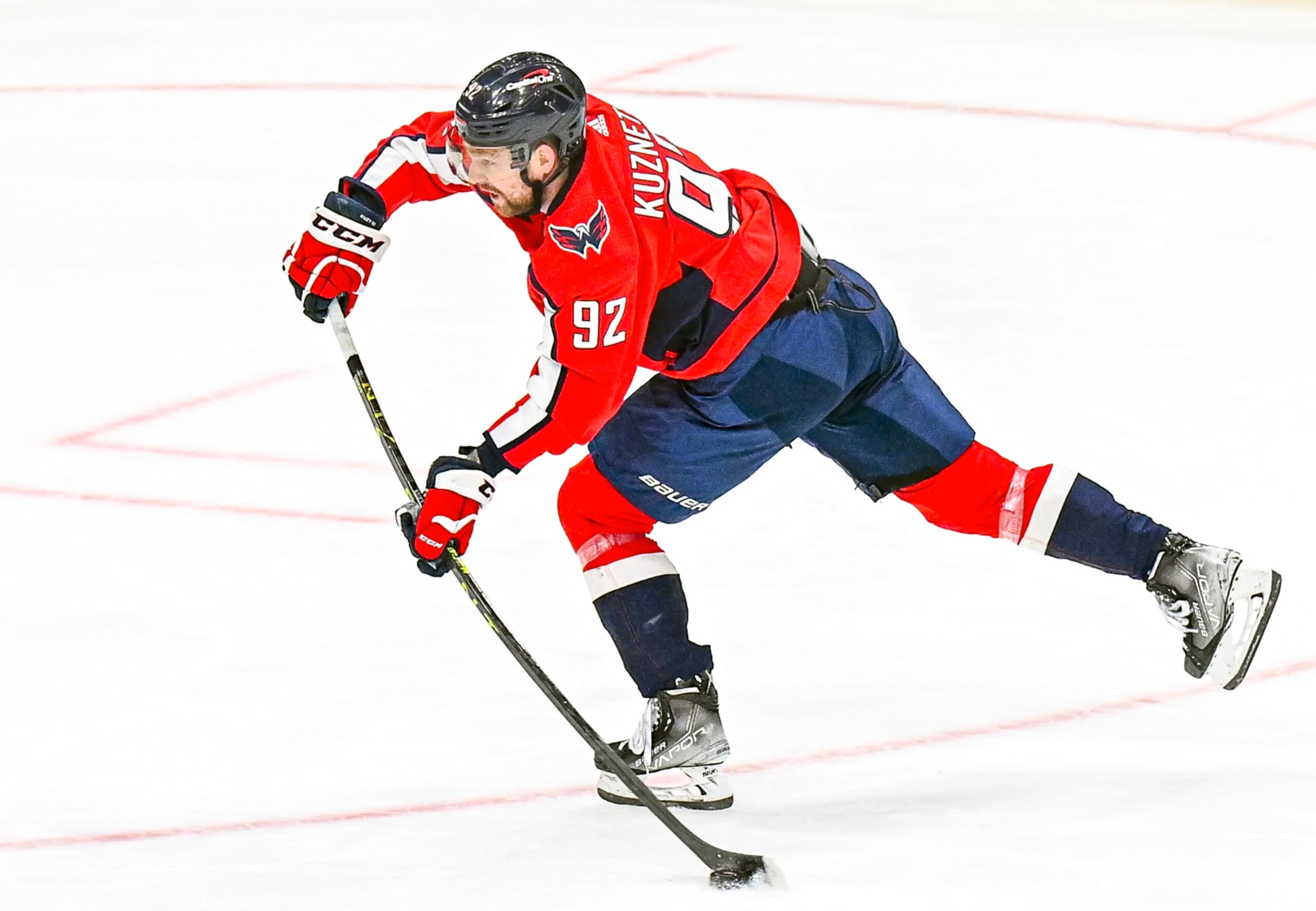WASHINGTON, DC - MARCH 21: Washington Capitals center Evgeny Kuznetsov (92) fires a shot during the Columbus Blue Jackets game versus the Washington Capitals on March 21, 2023 at the Capital One Arena in Washington, D.C.   (Photo by Mark Goldman/Icon Sportswire via Getty Images)