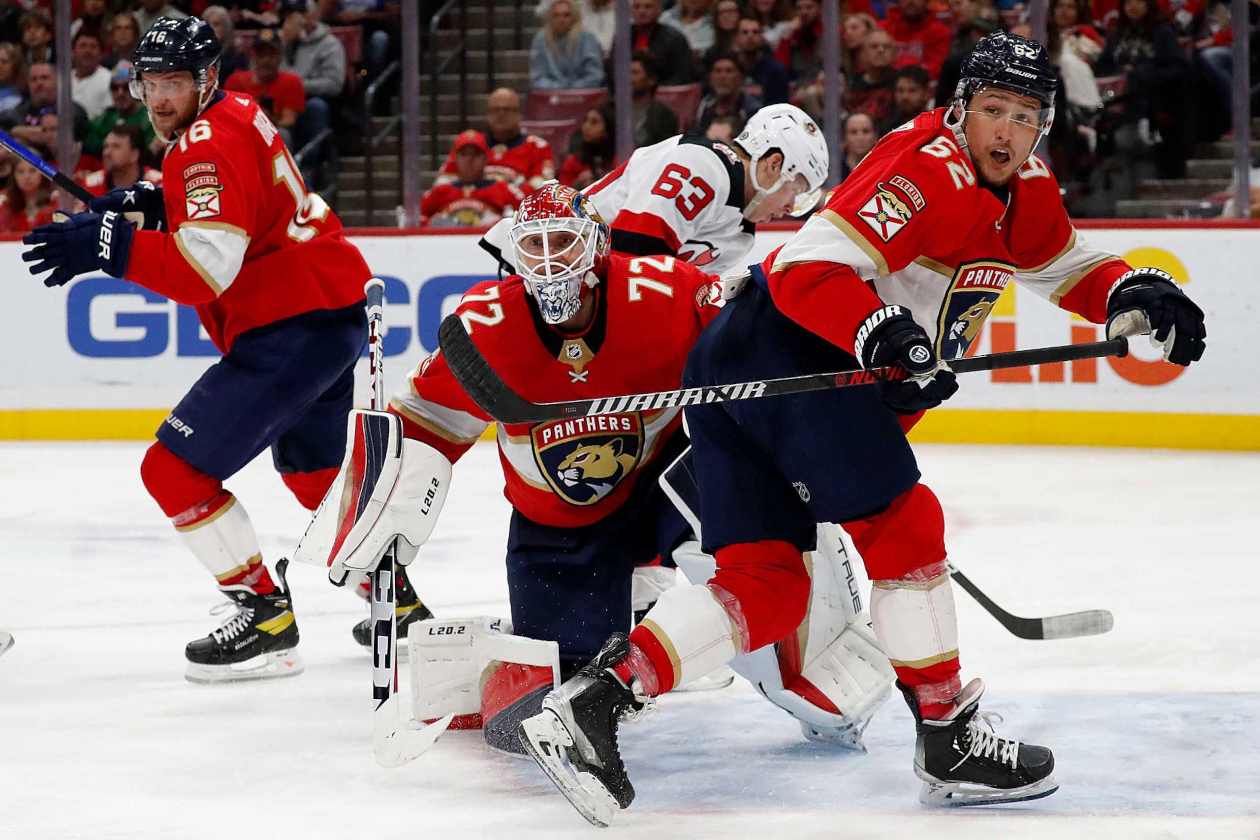 SUNRISE, FLORIDA - MARCH 18: Goaltender Sergei Bobrovsky #72 of the Florida Panthers defends the net with the help of teammate Brandon Montour #62 against the New Jersey Devils at the FLA Live Arena on March 18, 2023 in Sunrise, Florida. (Photo by Eliot J. Schechter/NHLI via Getty Images)