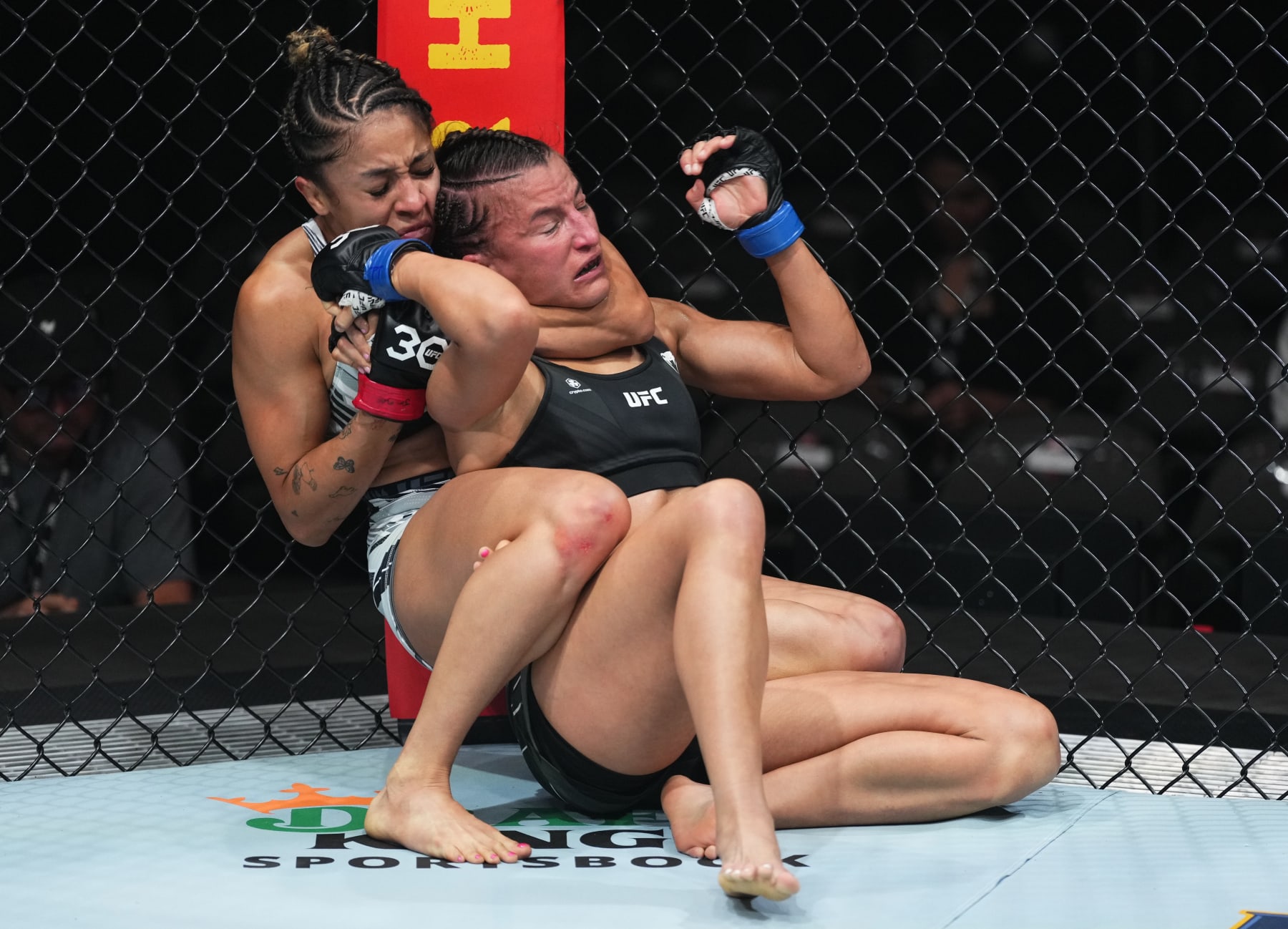 MIAMI, FLORIDA - APRIL 08: (L-R) Jaqueline Amorim of Brazil works for a submission against Sam Hughes in a strawweight fight during the UFC 287 event at Kaseya Center on April 08, 2023 in Miami, Florida. (Photo by Jeff Bottari/Zuffa LLC via Getty Images)