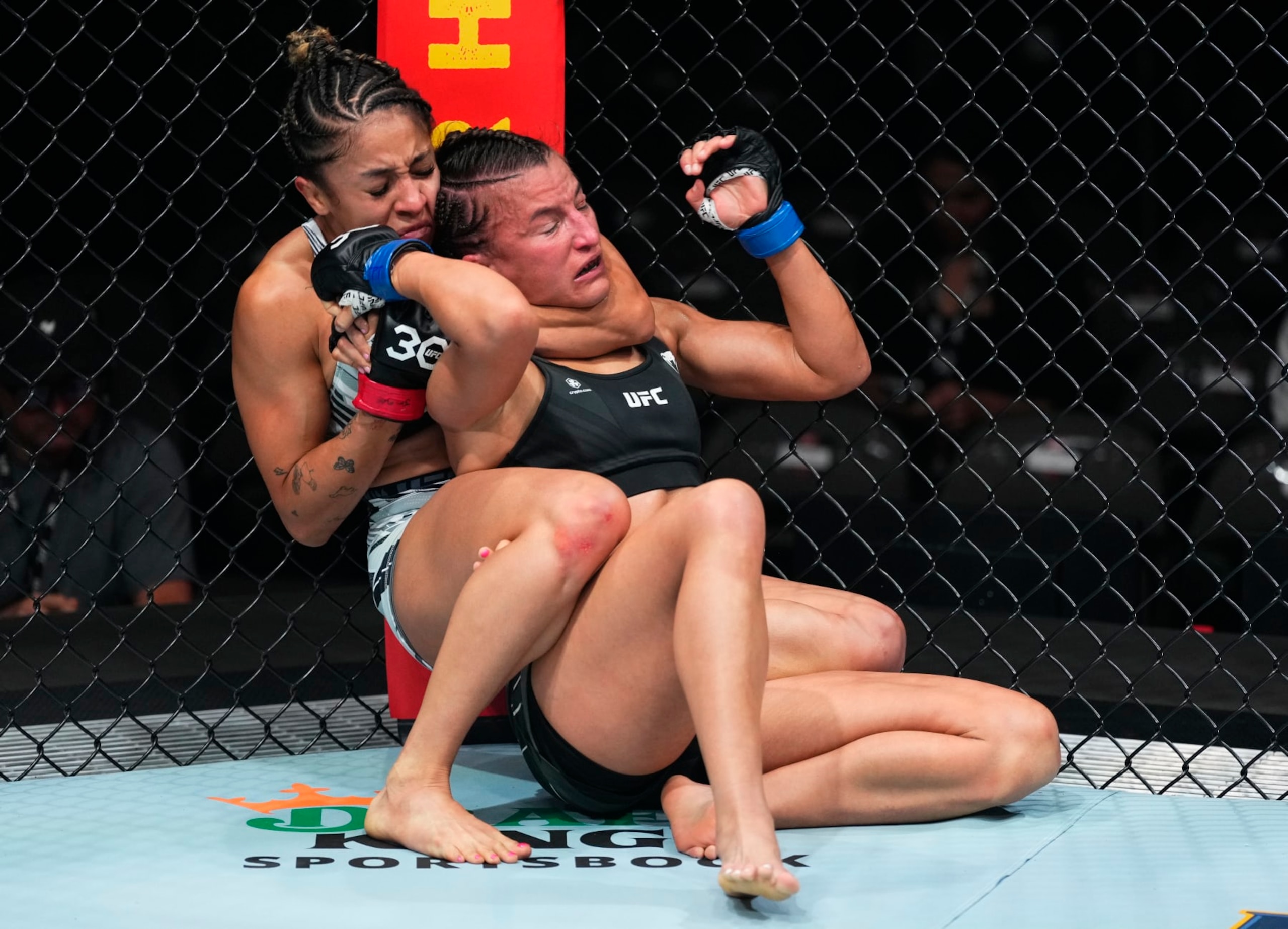 MIAMI, FLORIDA - APRIL 08: (L-R) Jaqueline Amorim of Brazil works for a submission against Sam Hughes in a strawweight fight during the UFC 287 event at Kaseya Center on April 08, 2023 in Miami, Florida. (Photo by Jeff Bottari/Zuffa LLC via Getty Images)