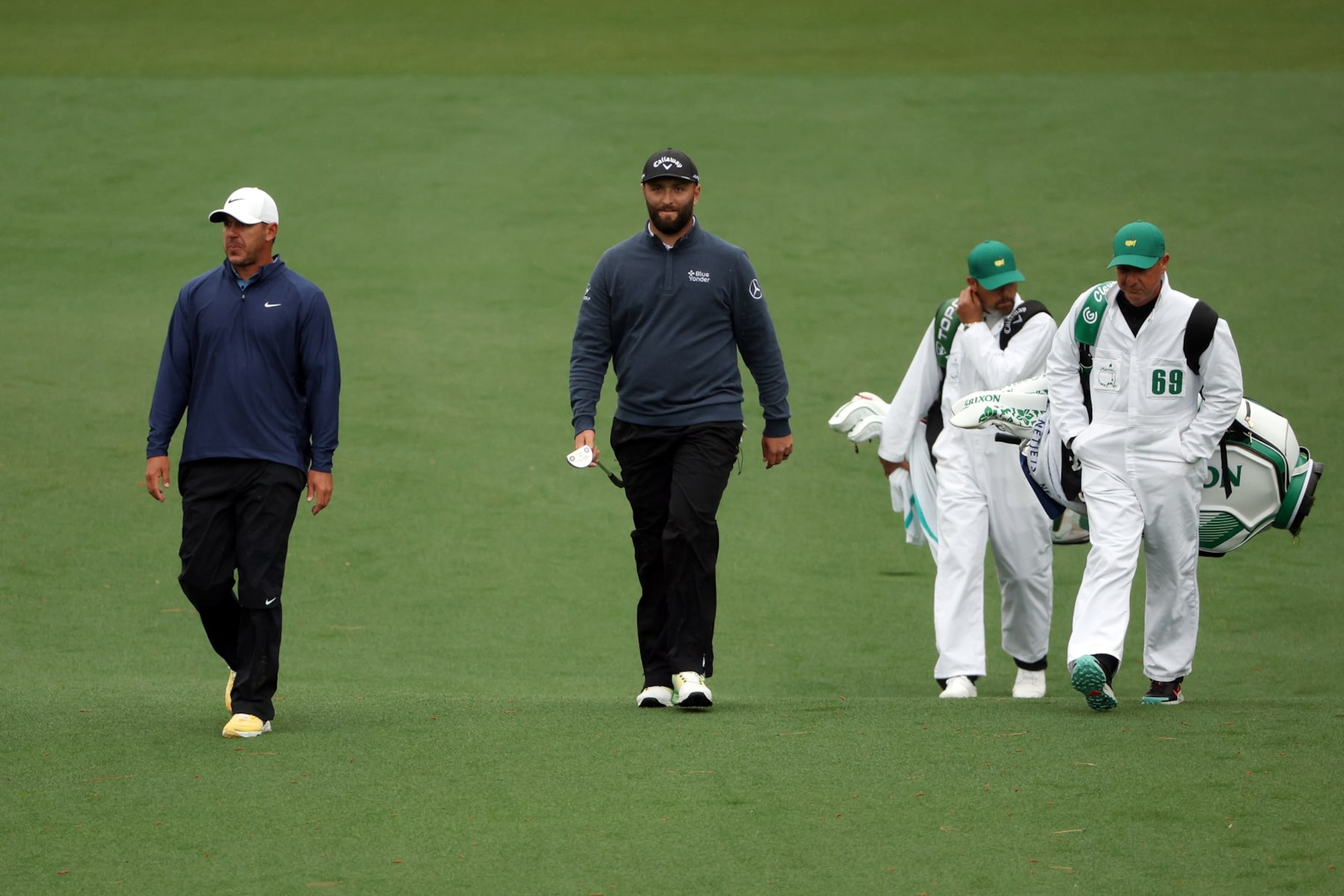 AUGUSTA, GEORGIA - APRIL 08: Brooks Koepka of the United States and Jon Rahm of Spain walk down the second fairway during the third round of the 2023 Masters Tournament at Augusta National Golf Club on April 08, 2023 in Augusta, Georgia. (Photo by Patrick Smith/Getty Images)