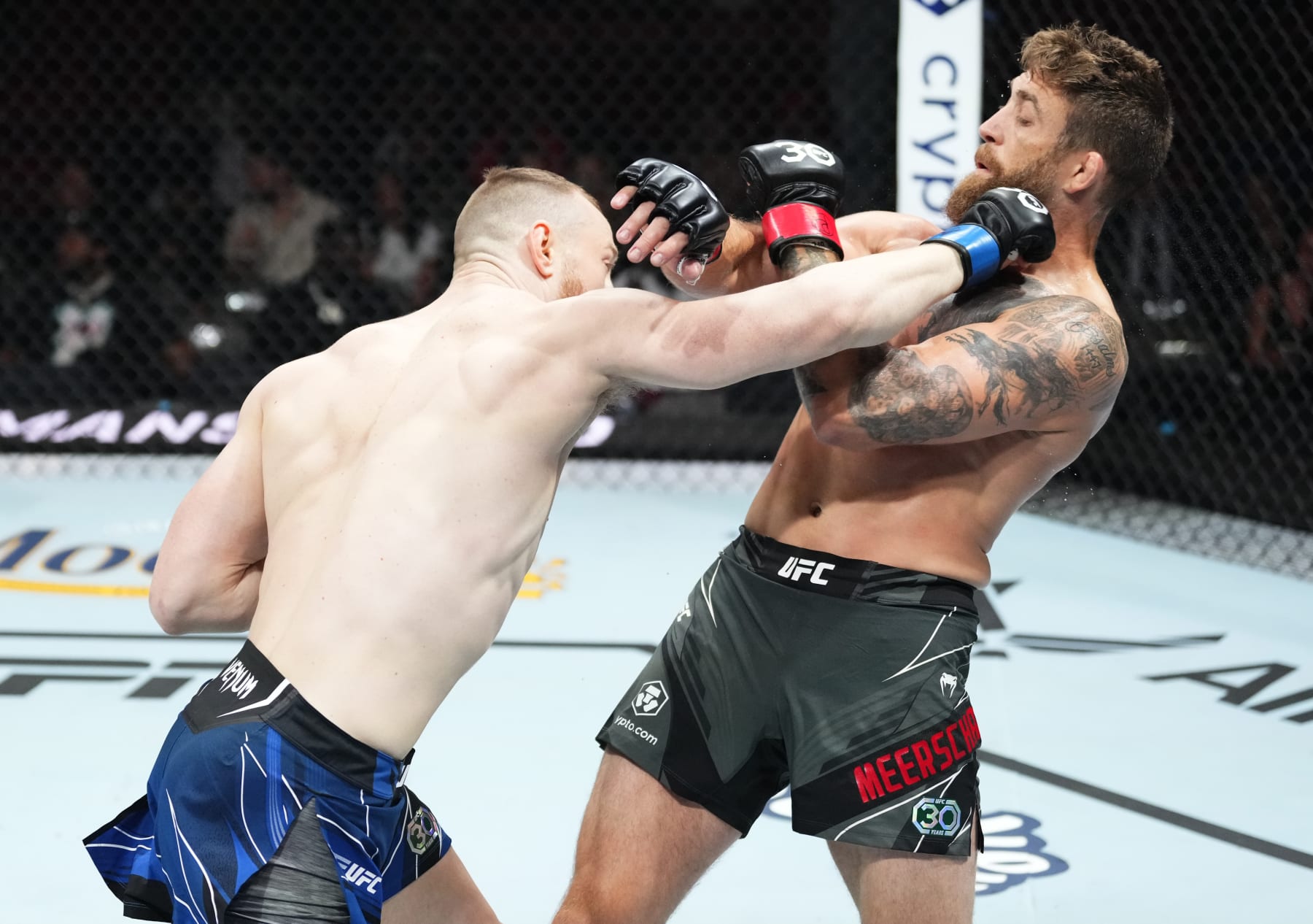 MIAMI, FLORIDA - APRIL 08: (L-R) Joe Pyfer punches Gerald Meerschaert in a middleweight fight during the UFC 287 event at Kaseya Center on April 08, 2023 in Miami, Florida. (Photo by Jeff Bottari/Zuffa LLC via Getty Images)